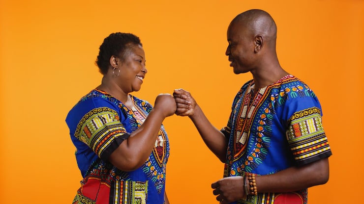 Liberian traditional greeting handshake between two men