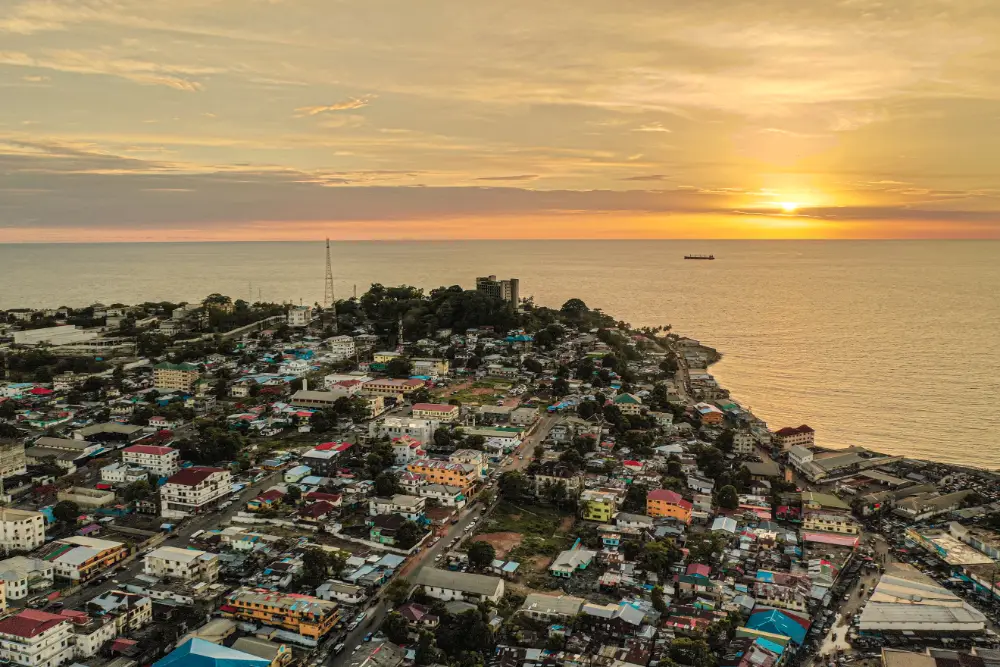 Monrovia Liberia city skyline at sunset with Atlantic Ocean in background