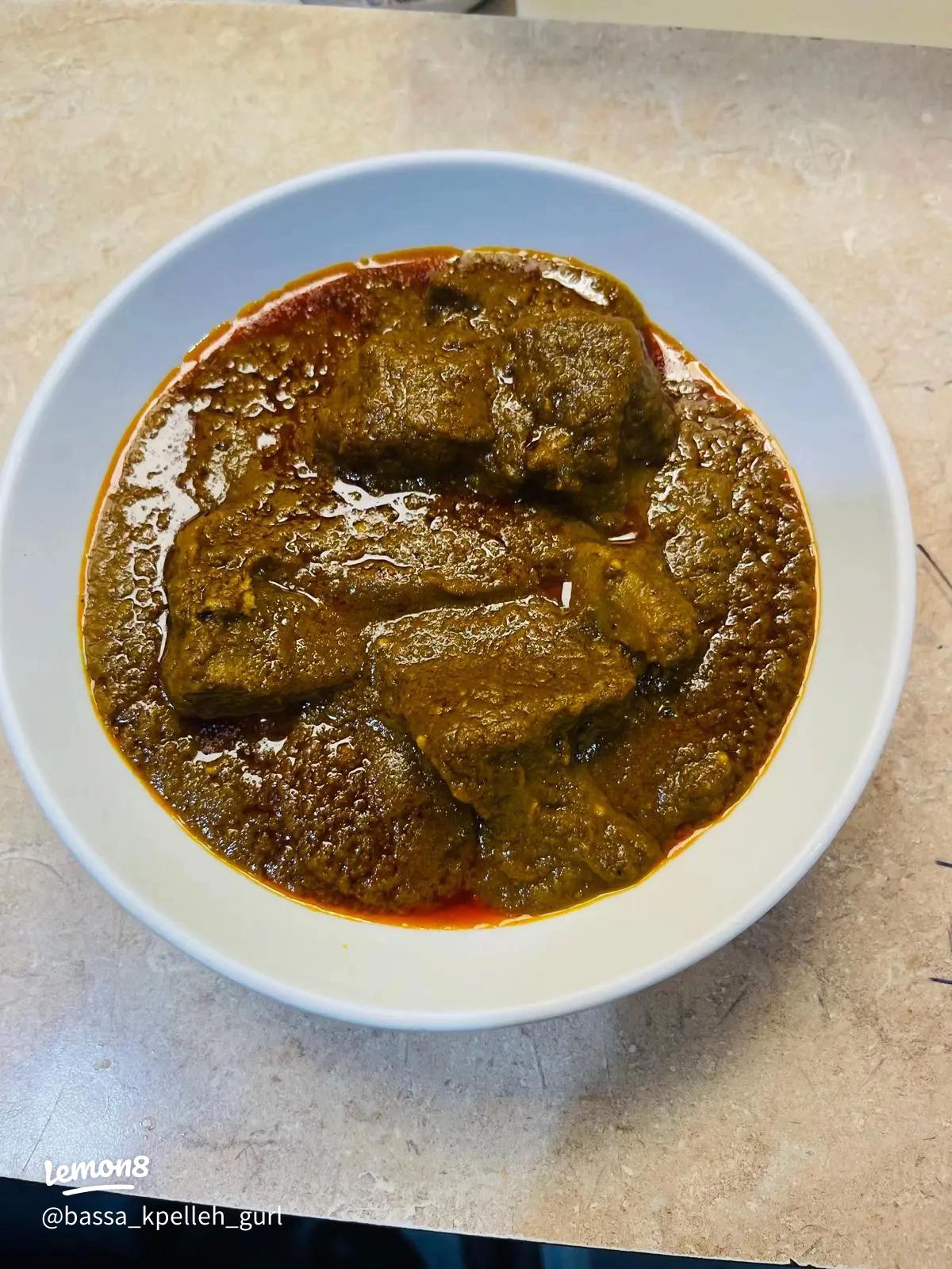 Traditional Liberian food spread with palm butter soup and fufu