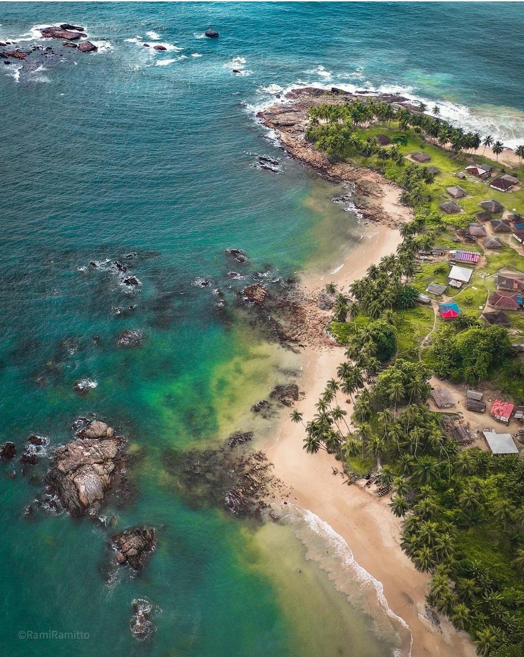 Silver Beach Monrovia Liberia with local vendors and ocean waves