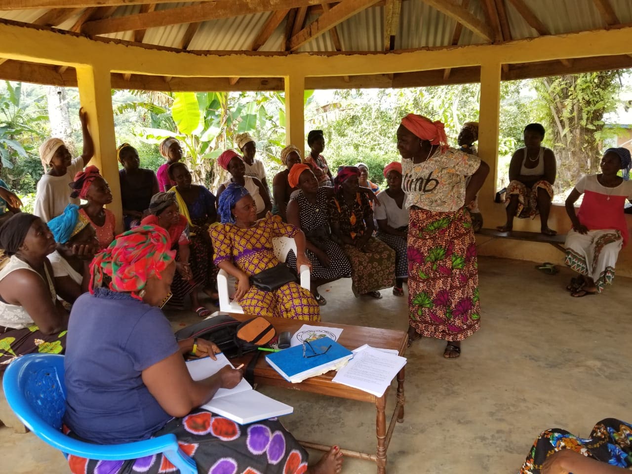Women participating in a community gathering in Liberia