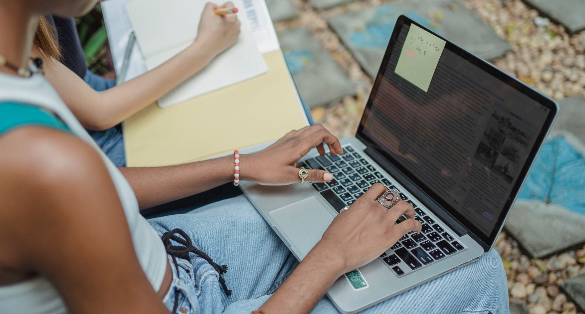 student using laptop with AI writing interface
