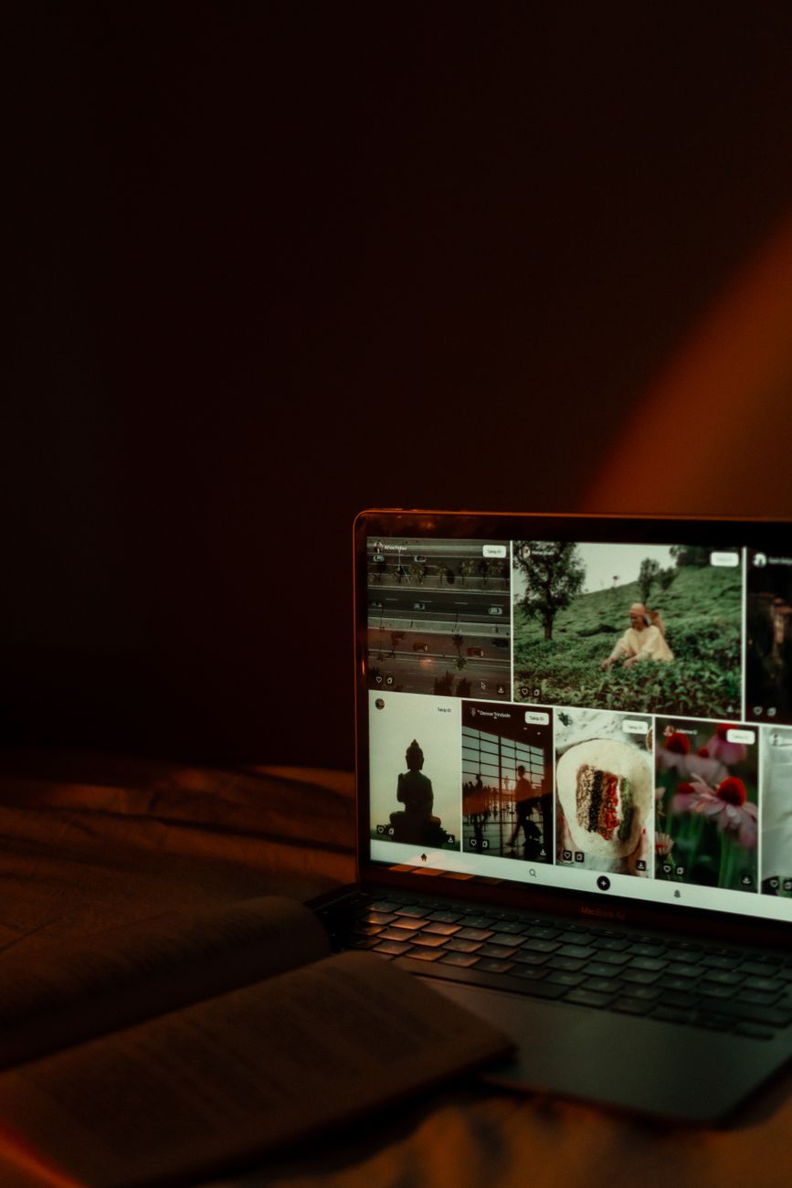 Content creator using AI tools on laptop for social media