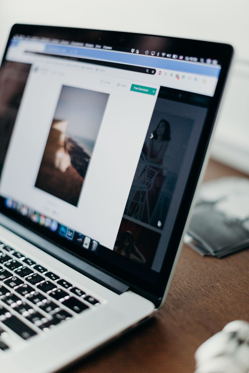 AI content workflow on a laptop with social media analytics dashboard