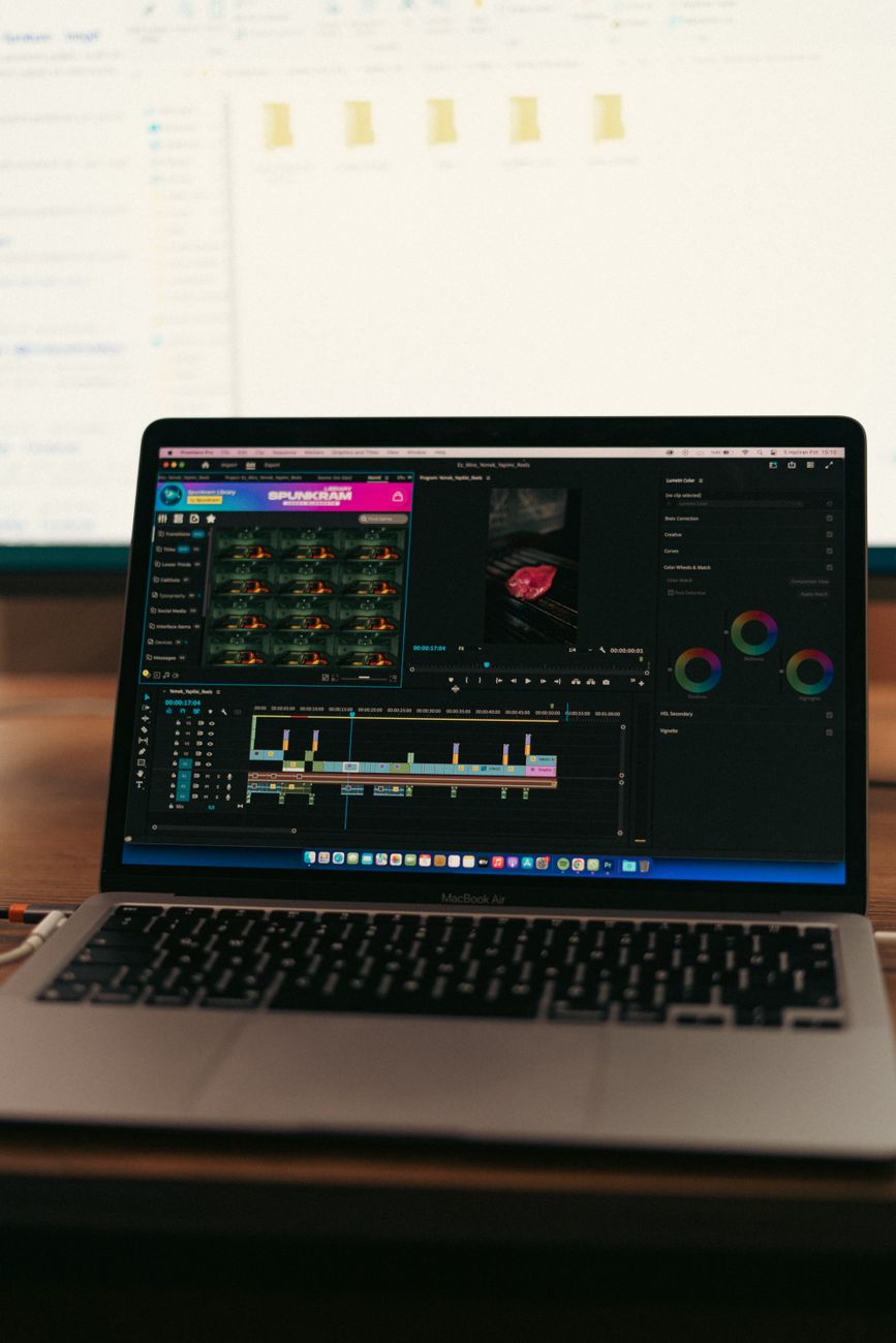 Creator using AI video generation tool on laptop for social media content