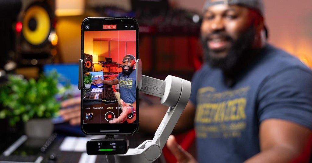Creator using a smartphone to write Instagram captions with an AI tool