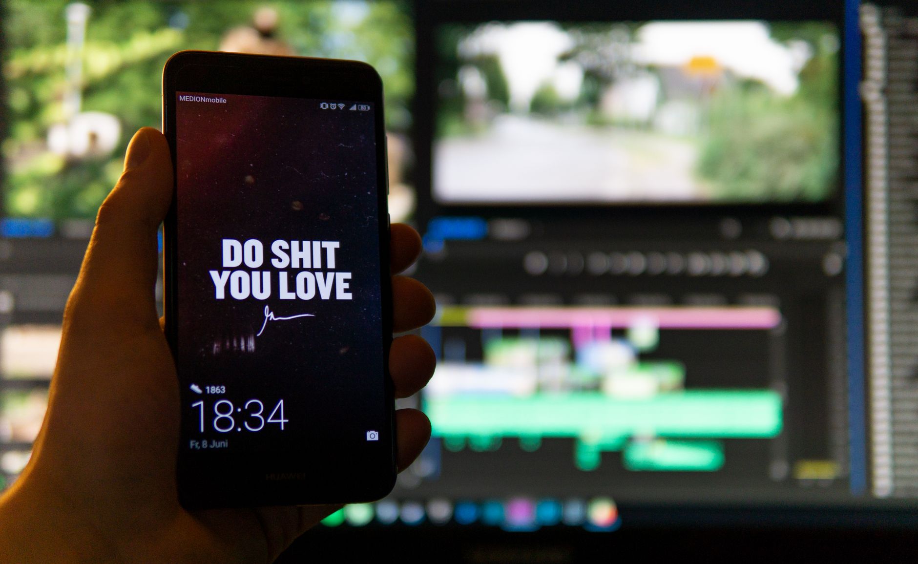 Smartphone screen showing video editing app with caption overlay