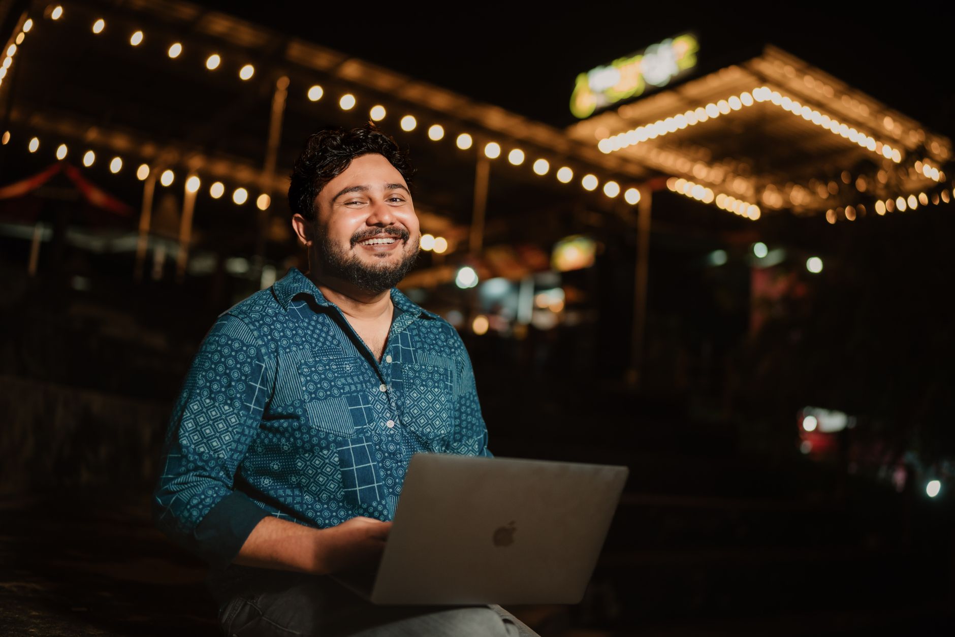Creator using AI tools on laptop for social media content planning