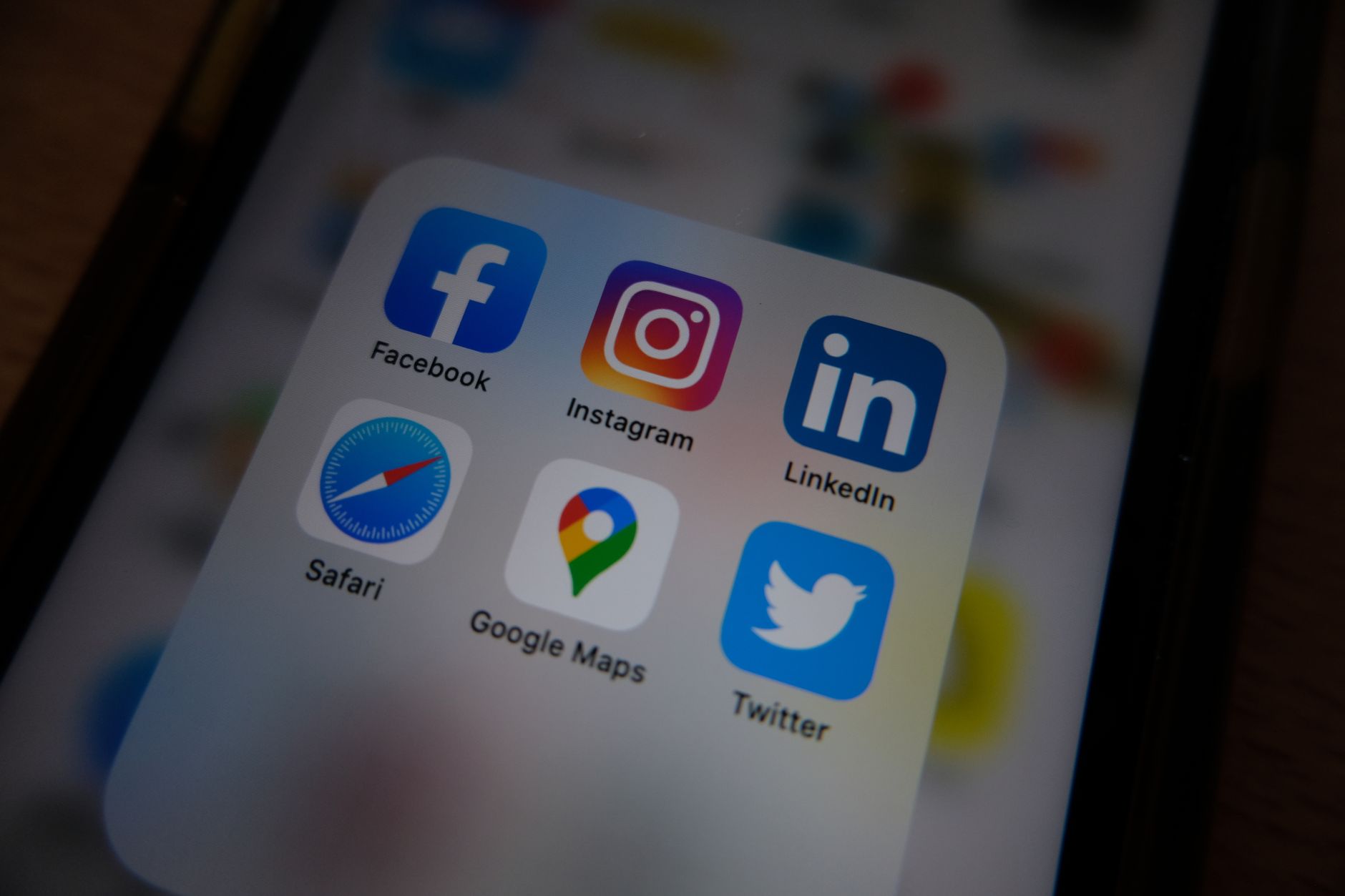 Social media platform icons displayed on smartphone screen