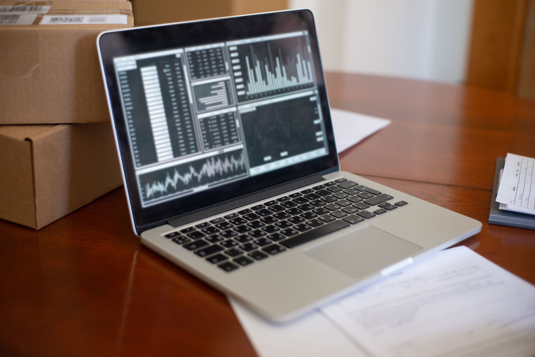 Small business owner planning digital marketing strategy on a laptop