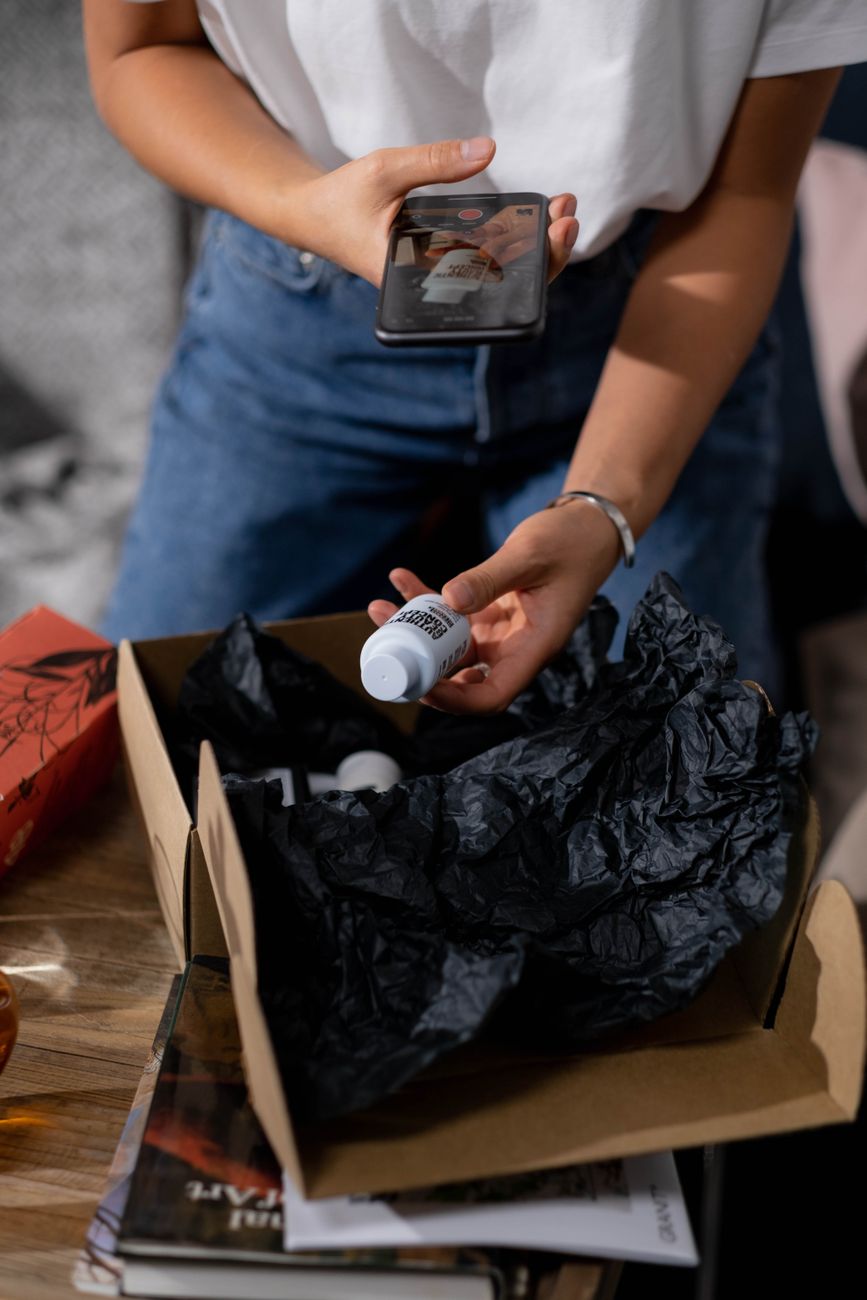 Customer taking photo of product for user generated content campaign
