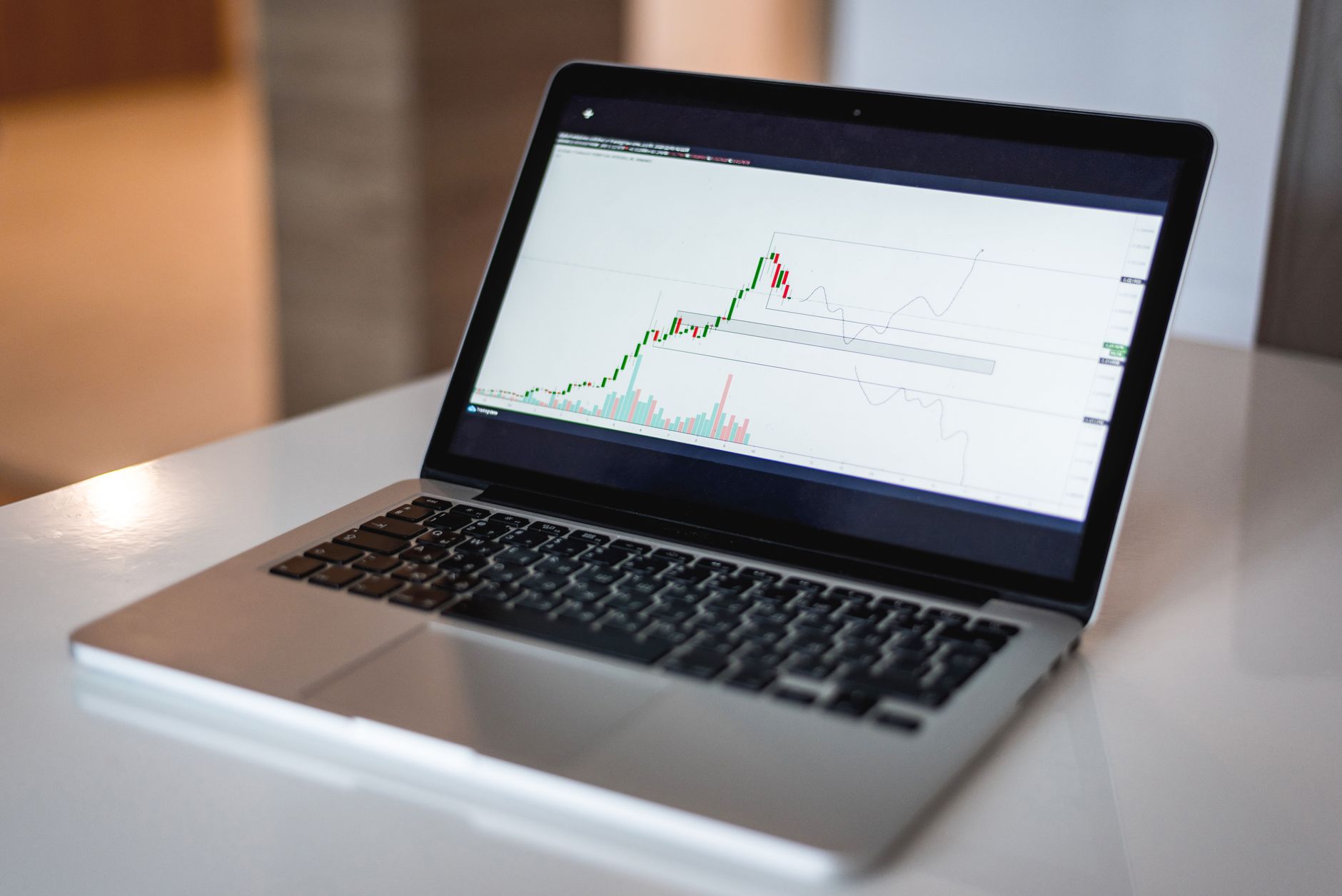 Marketer reviewing AI marketing dashboard on laptop