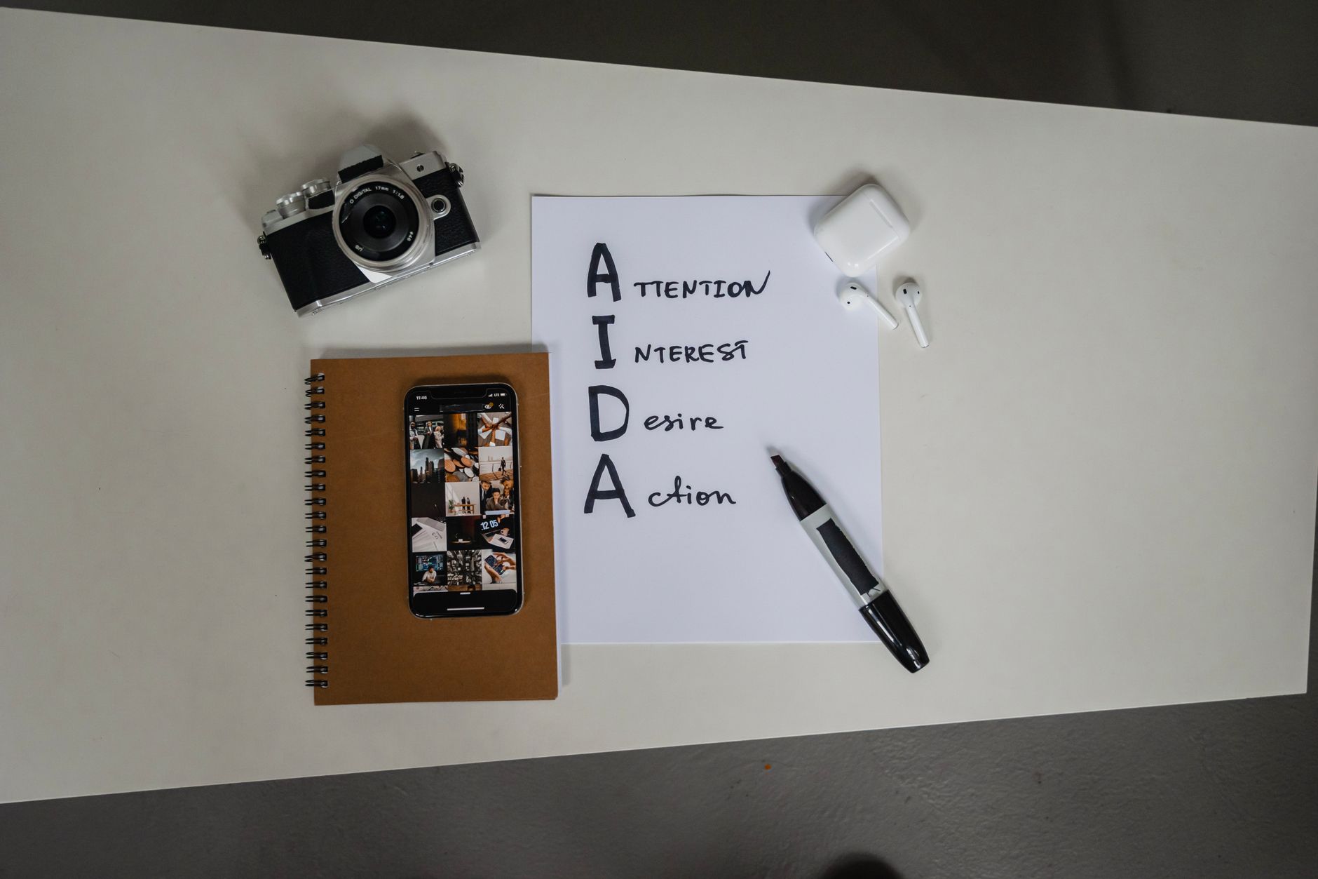 Marketer using AI tools to create digital marketing content on a computer