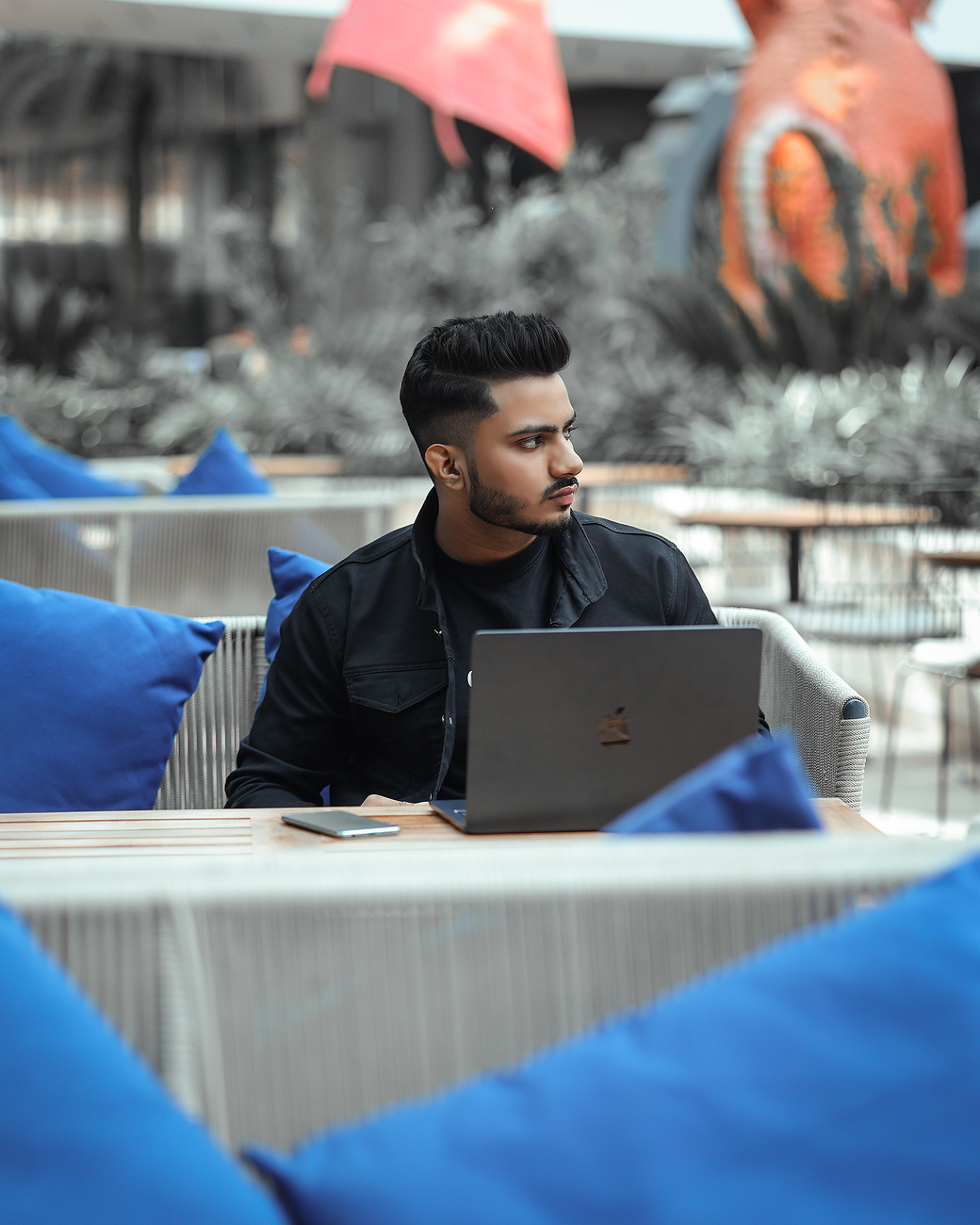 Person working on laptop with digital marketing analytics dashboard open