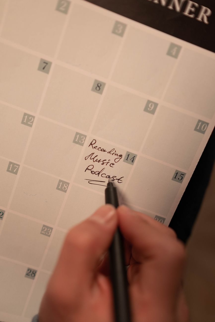 Social media content calendar and scheduling tools on a desk