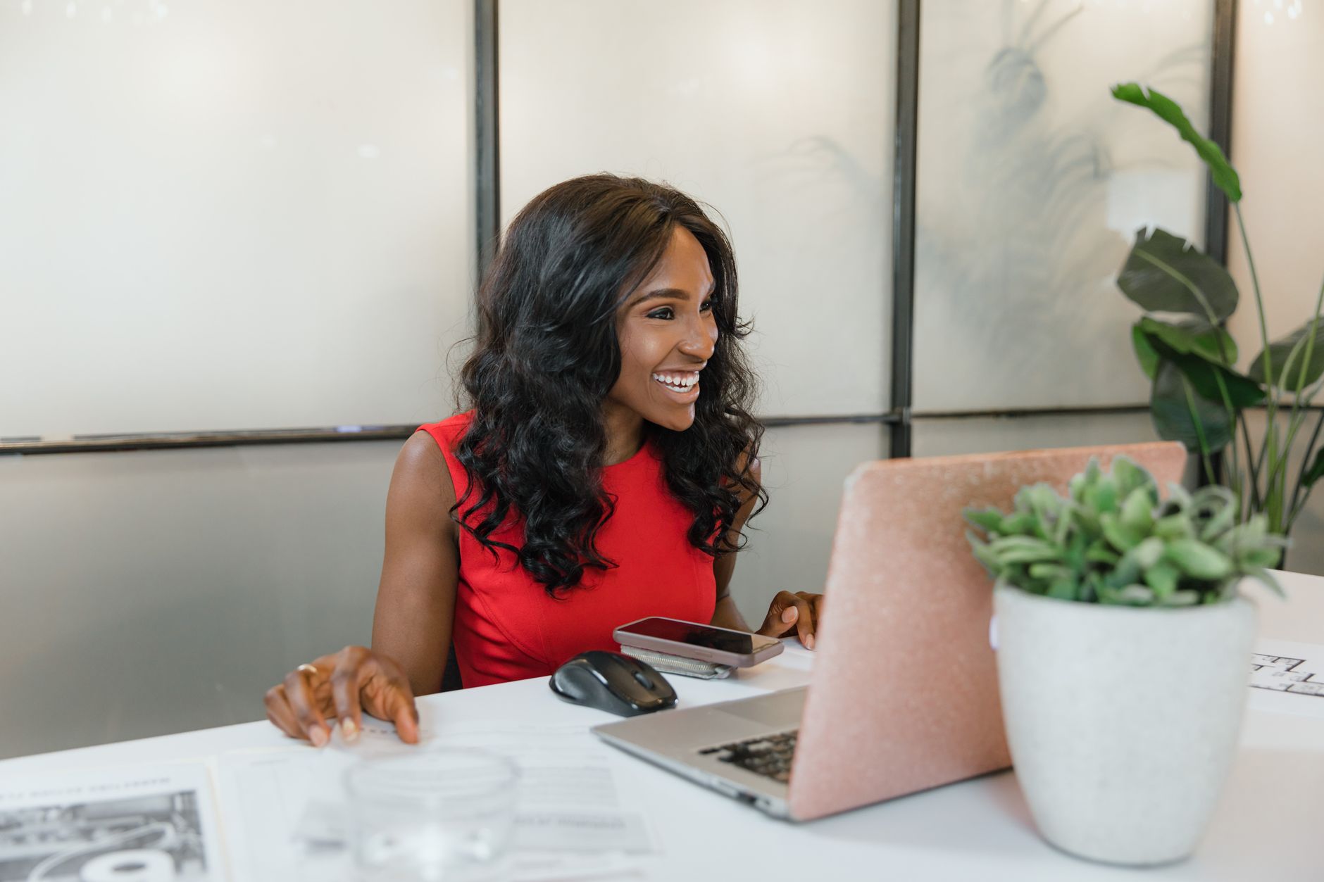 Business owner reviewing digital marketing strategy on a laptop
