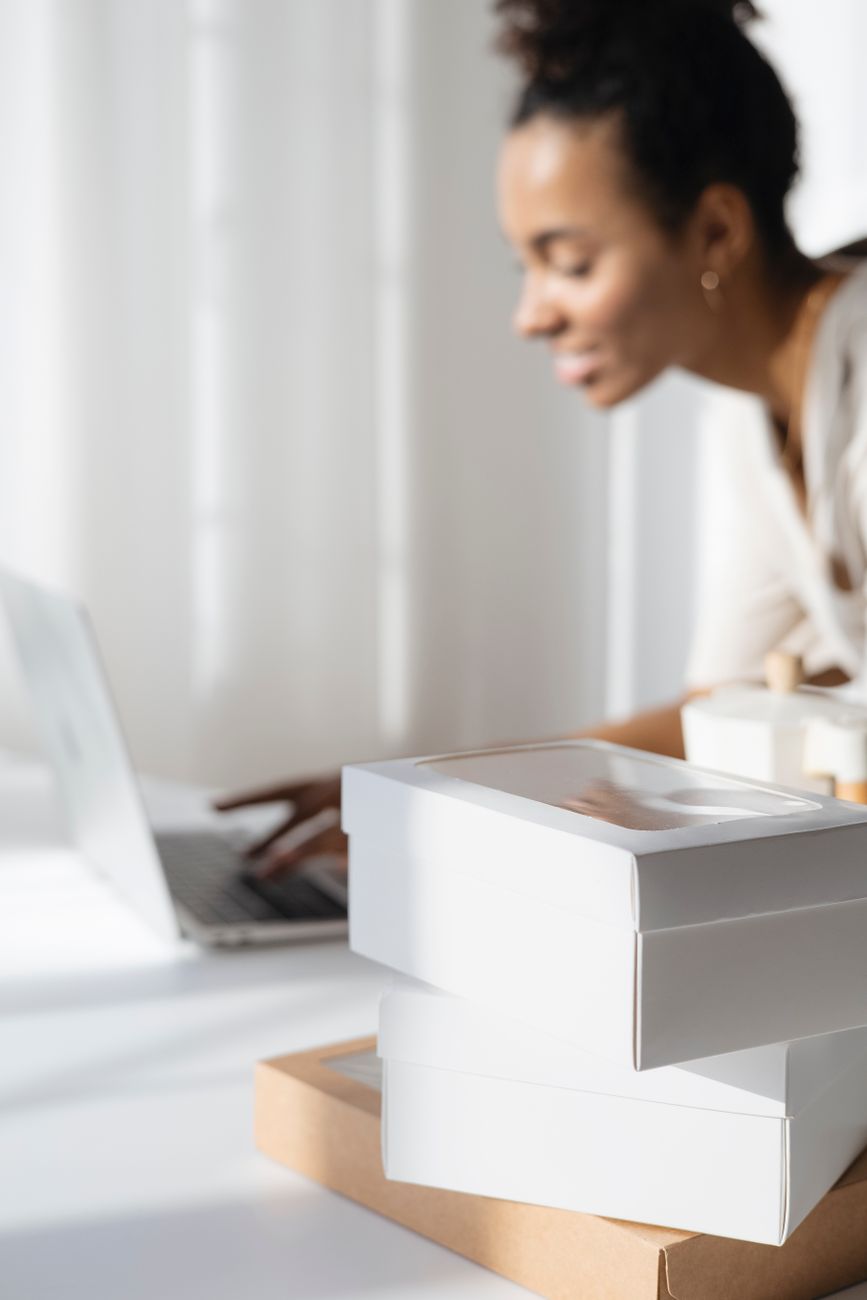 Small business owner reviewing digital marketing strategy on laptop