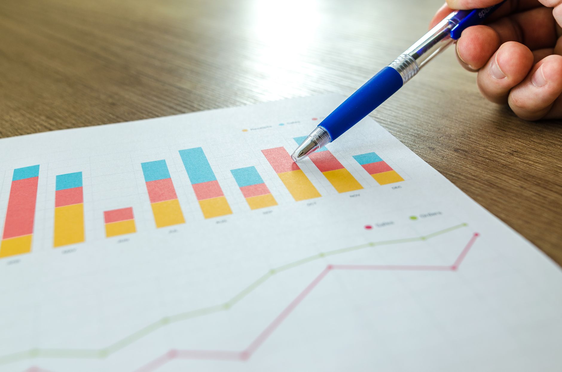 Marketer reviewing SEO analytics dashboard to optimize existing blog content