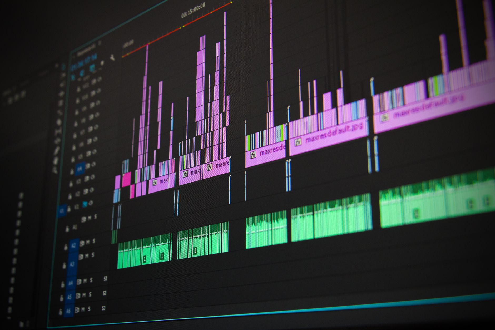 Marketer reviewing short-form video analytics on a laptop dashboard