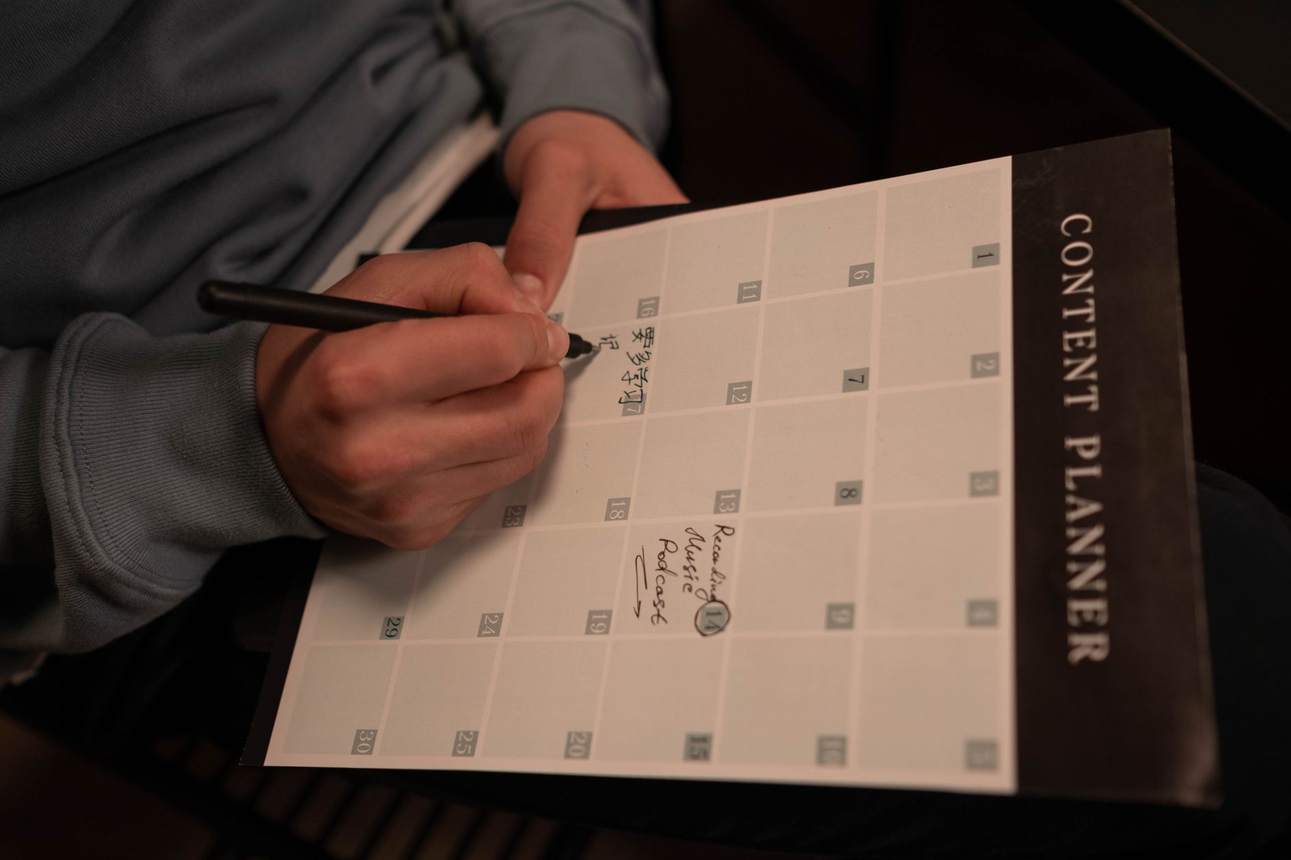 Content calendar planning session with sticky notes and laptop