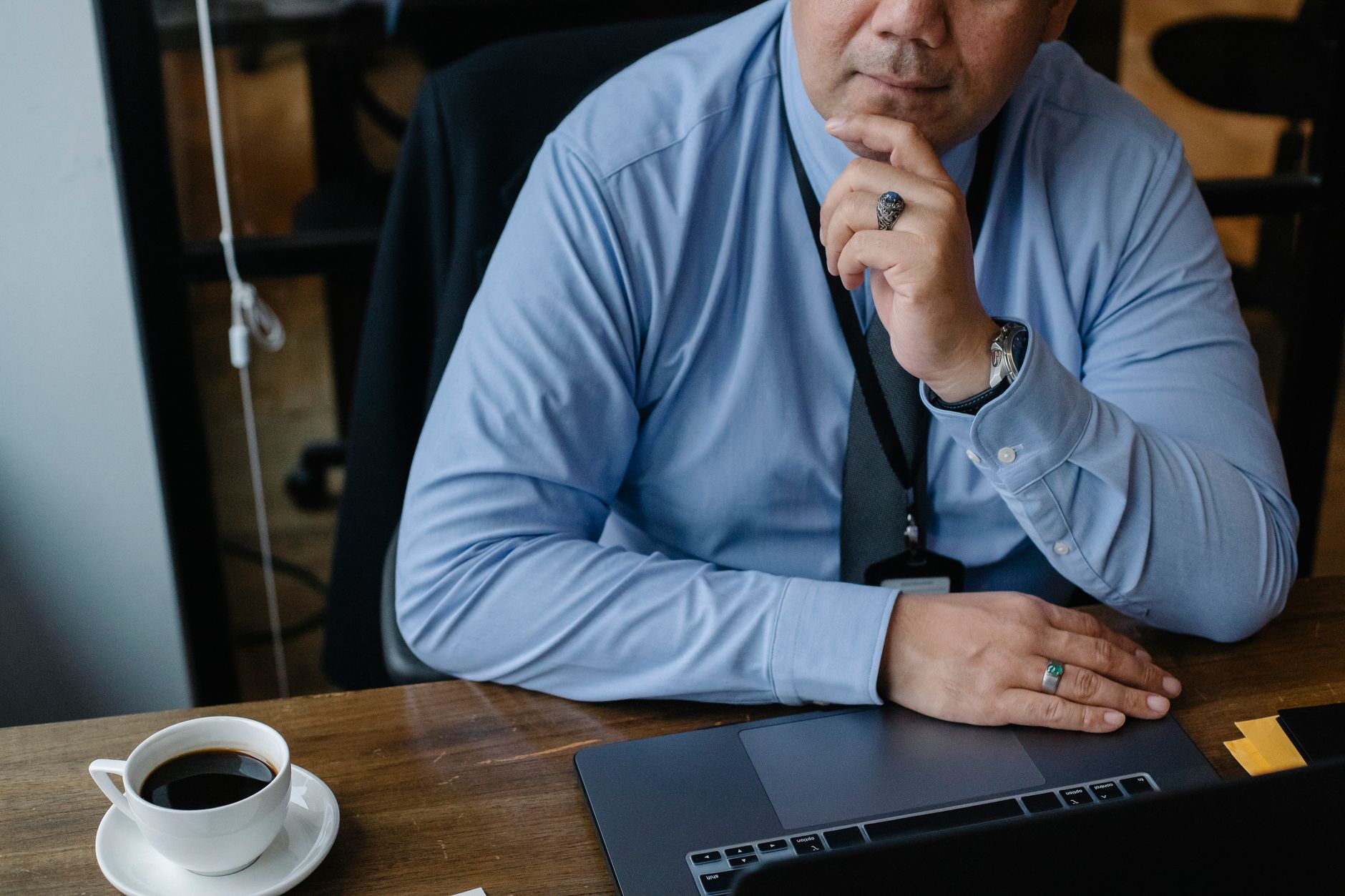 Small business owner reviewing digital marketing strategy on laptop