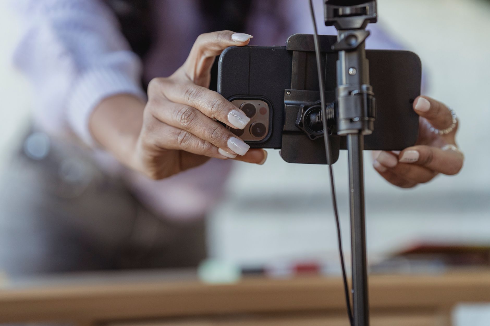 Person filming short-form video content for social media with a smartphone