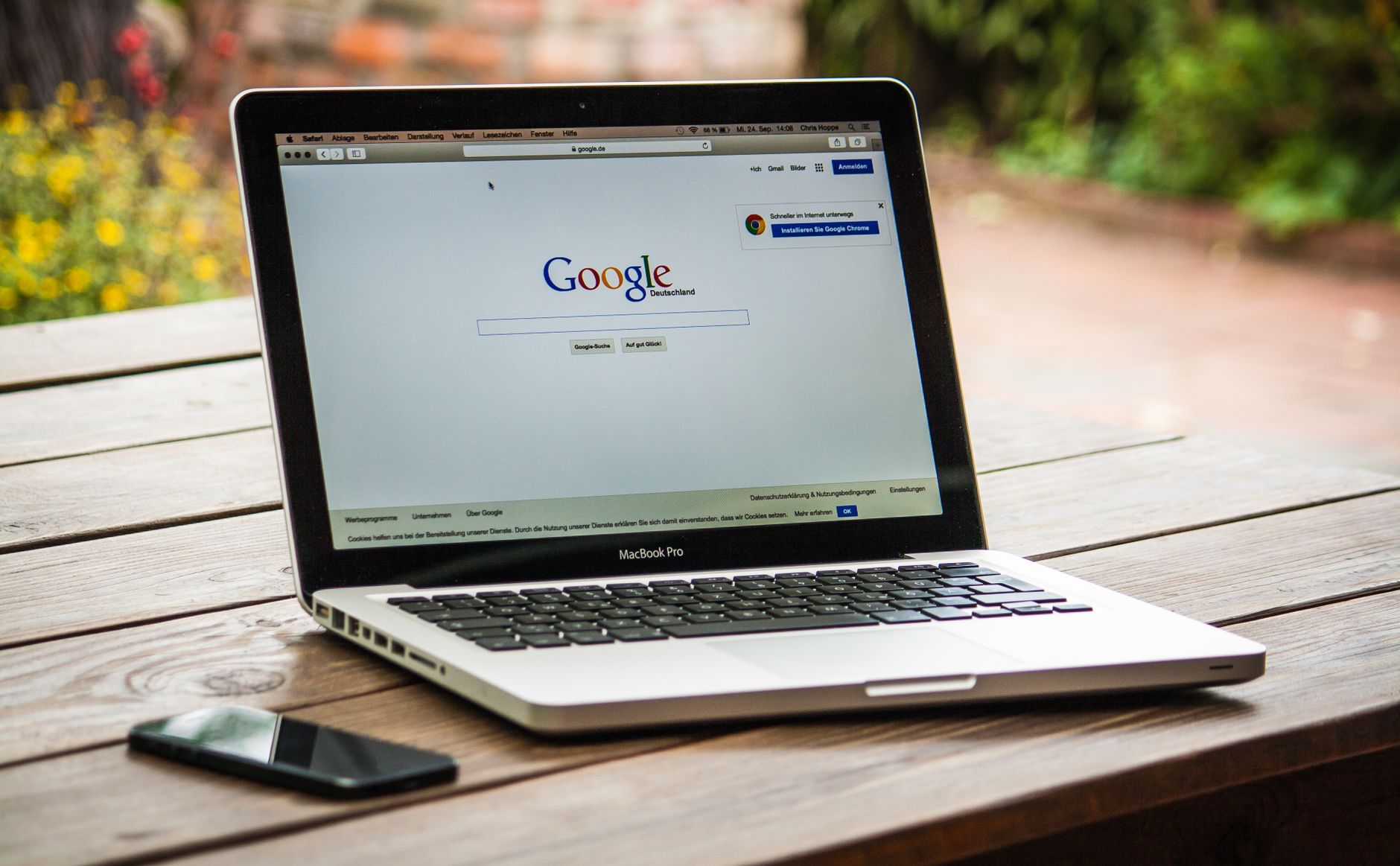 Person comparing free and paid SEO tools on laptop screen