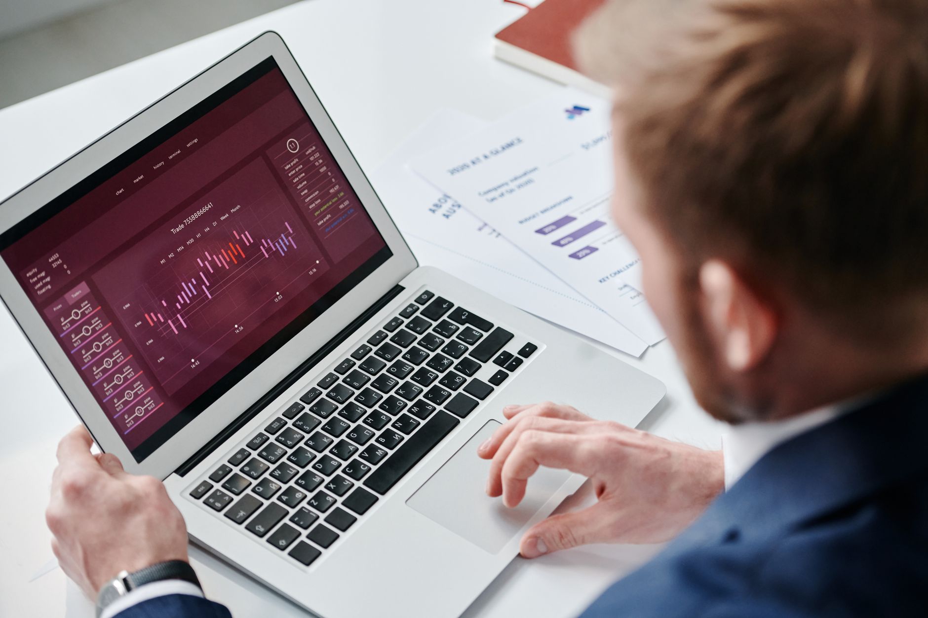 Business owner reviewing SEO analytics dashboard on laptop