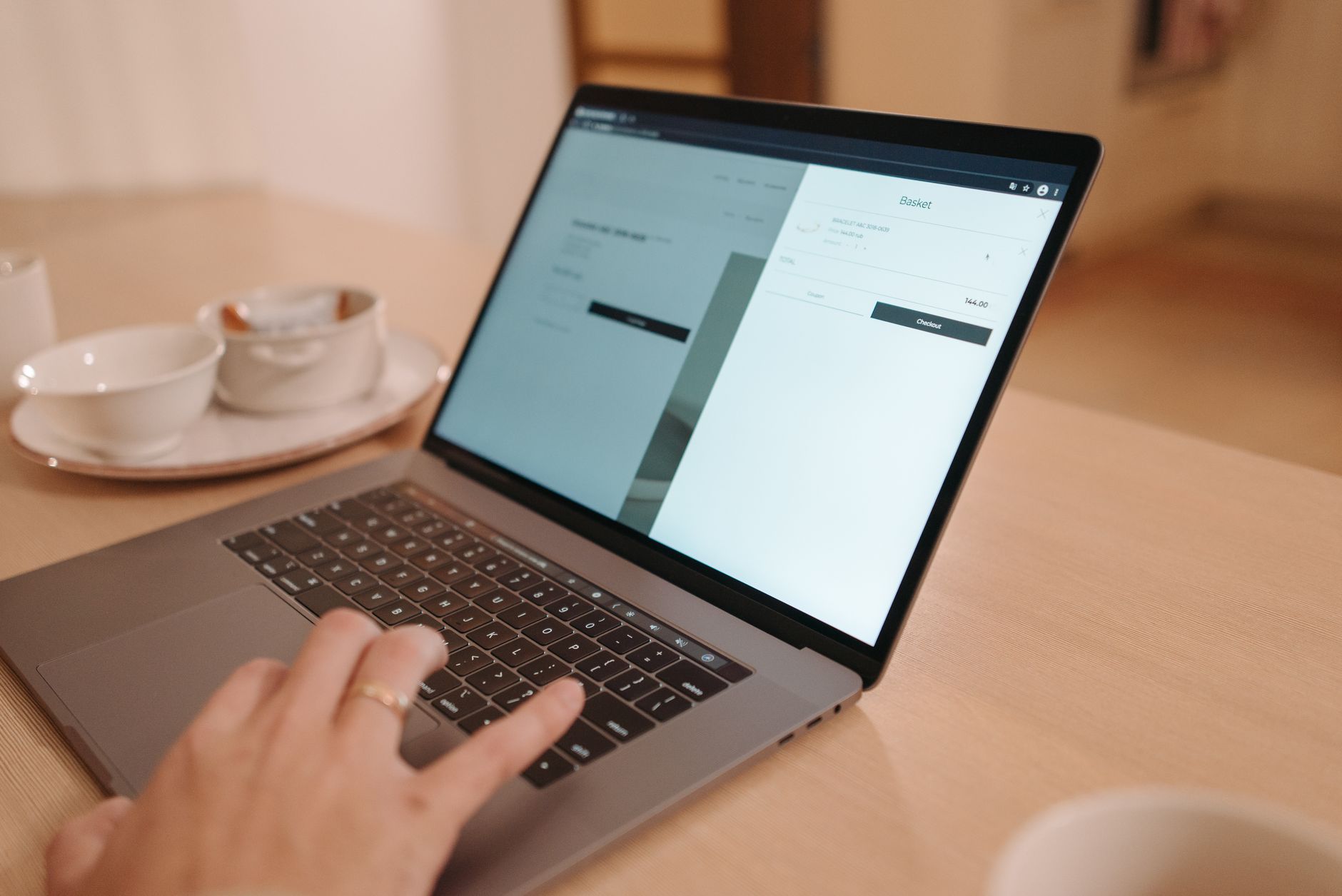 Person reviewing SEO score on laptop with prioritized recommendations list