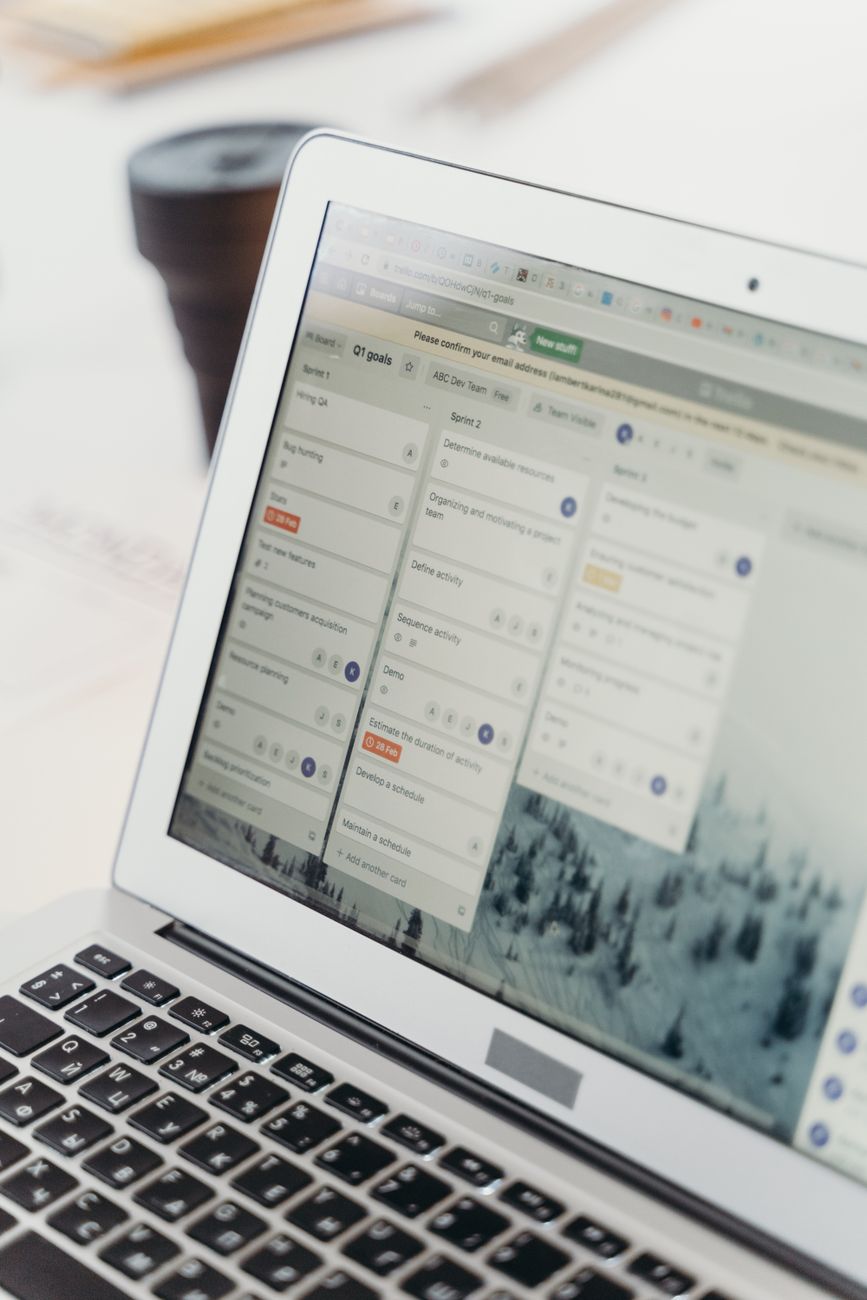 Person reviewing SEO recommendations on a laptop with a checklist