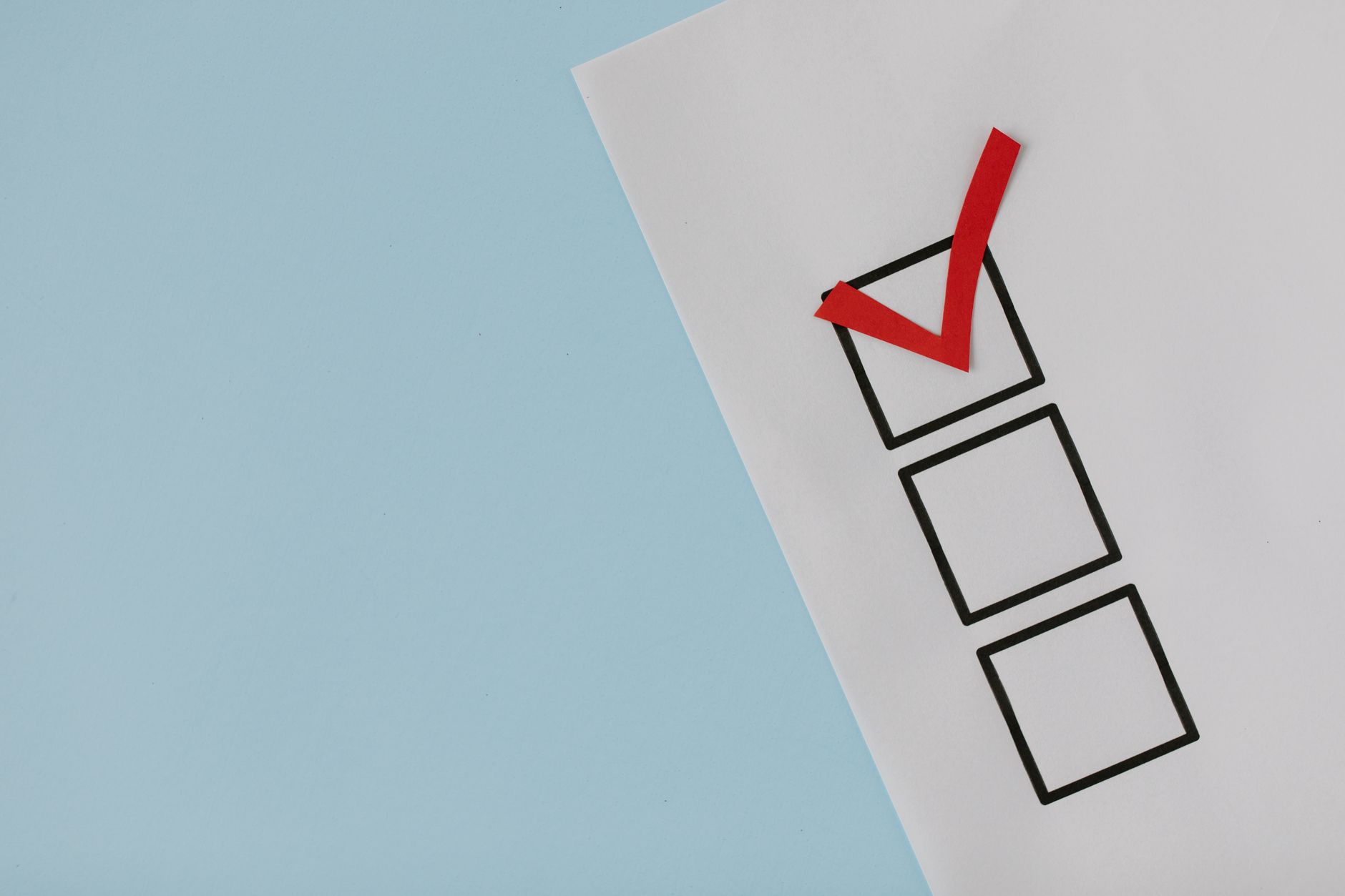 SEO priority checklist on a whiteboard with ranking growth chart