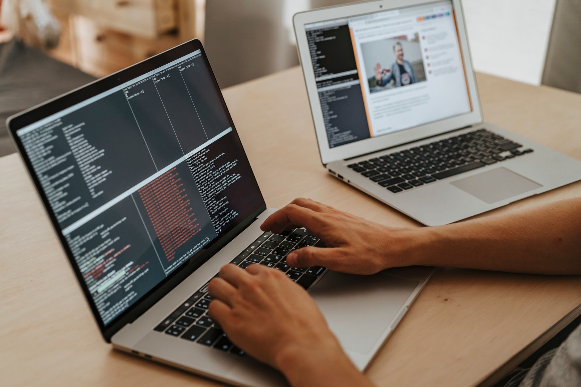 Person comparing SEO software tools on a laptop screen