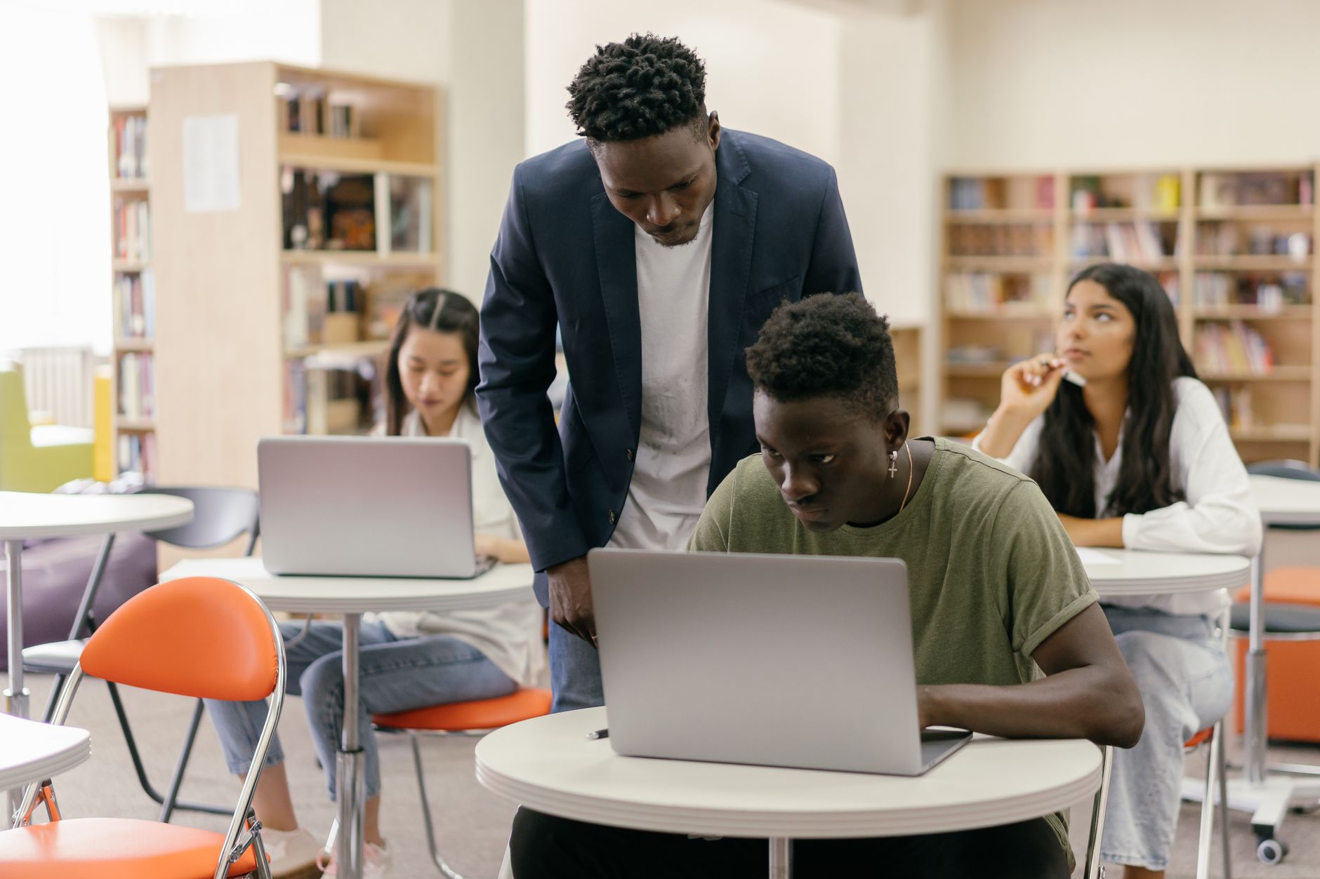 Student learning SEO audit tools on a laptop in a classroom