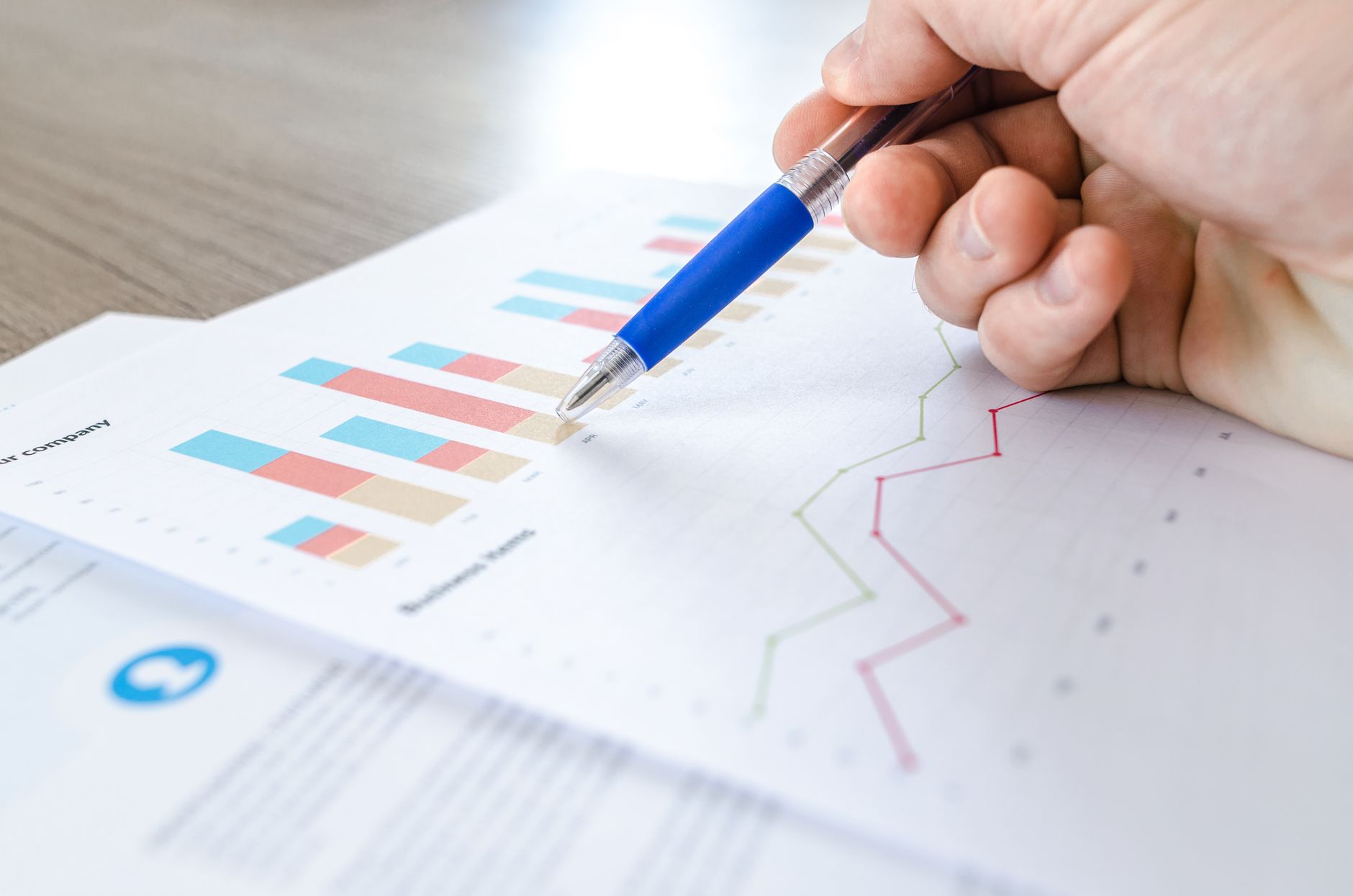 SEO professional analyzing website performance metrics on multiple screens