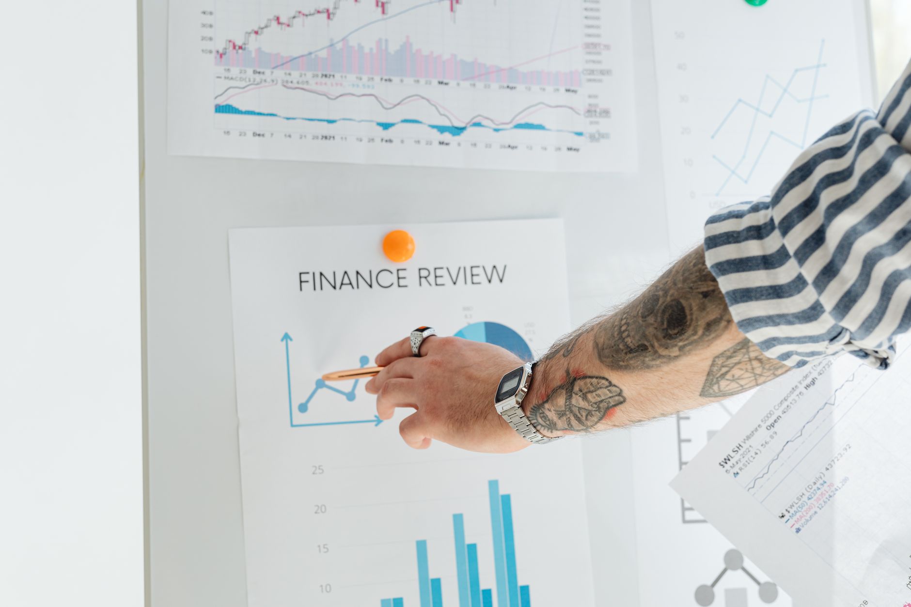 Person reviewing SEO performance metrics and audit results on a monitor