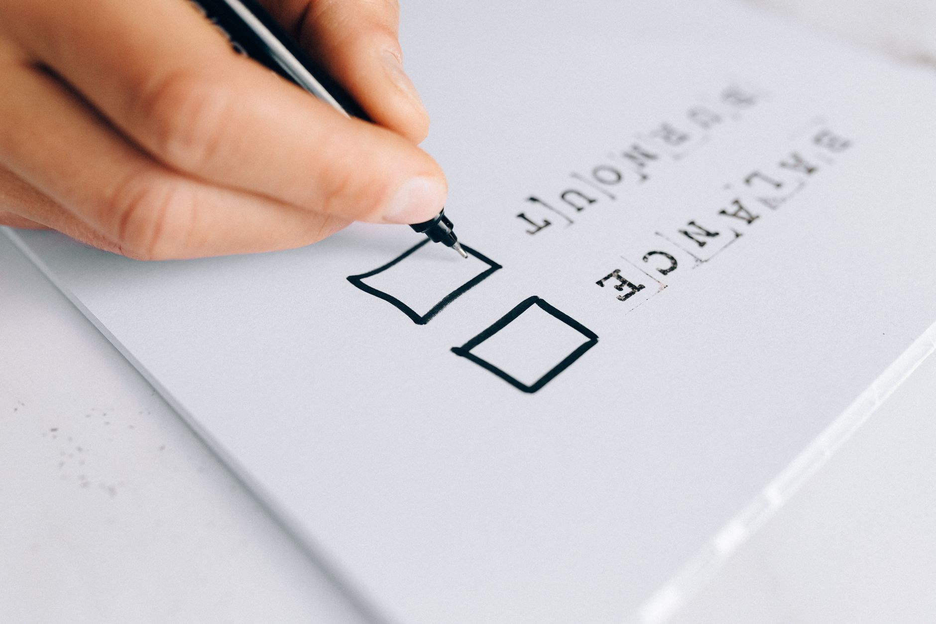 Checklist of outdated SEO practices being crossed off a whiteboard