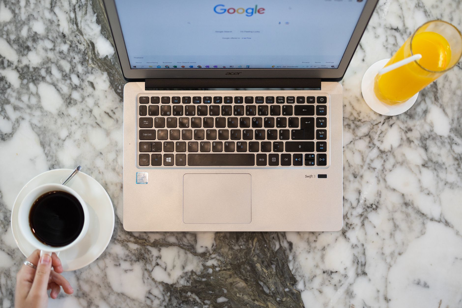 Google AI Overview appearing above traditional search results on a laptop screen