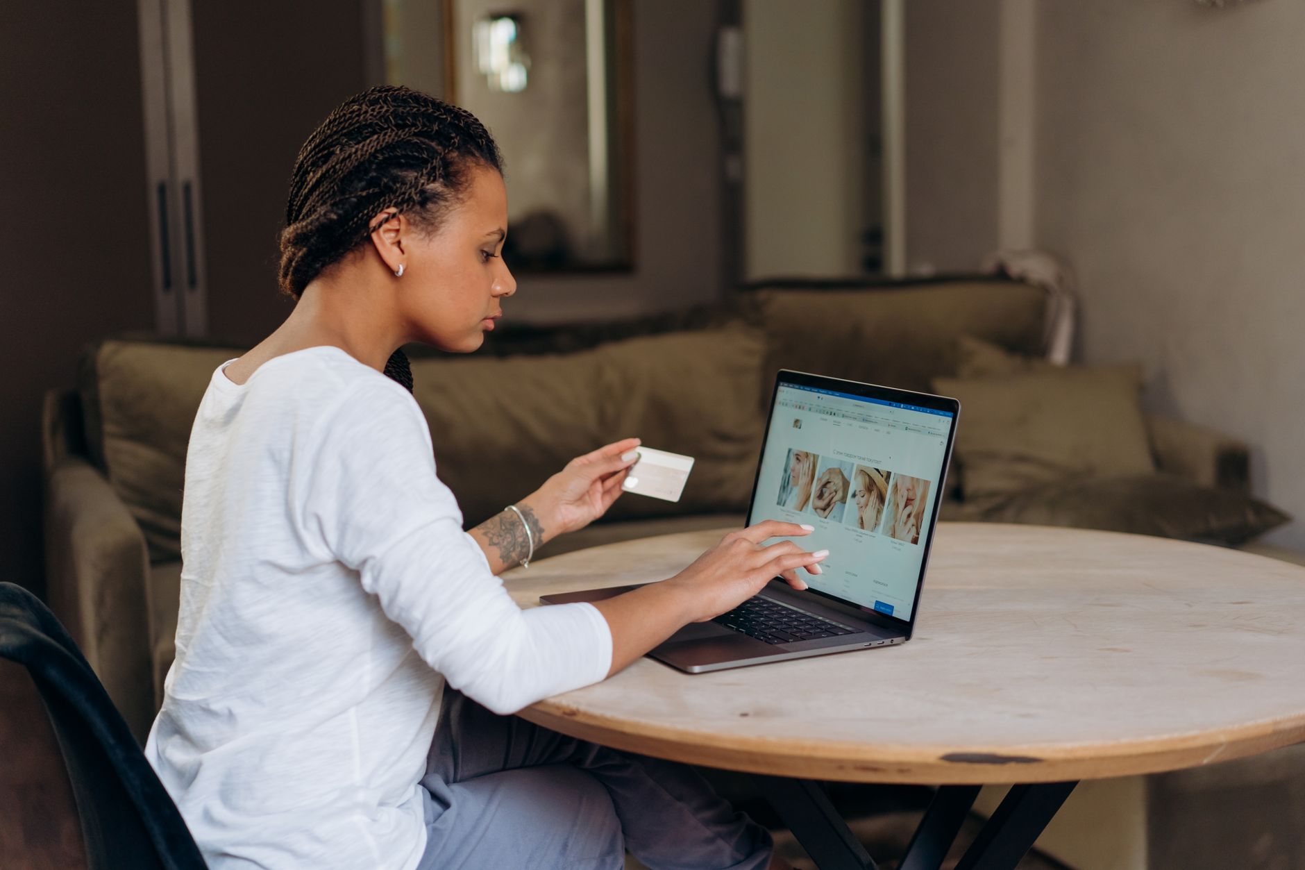 African fashion e-commerce products displayed on a laptop screen