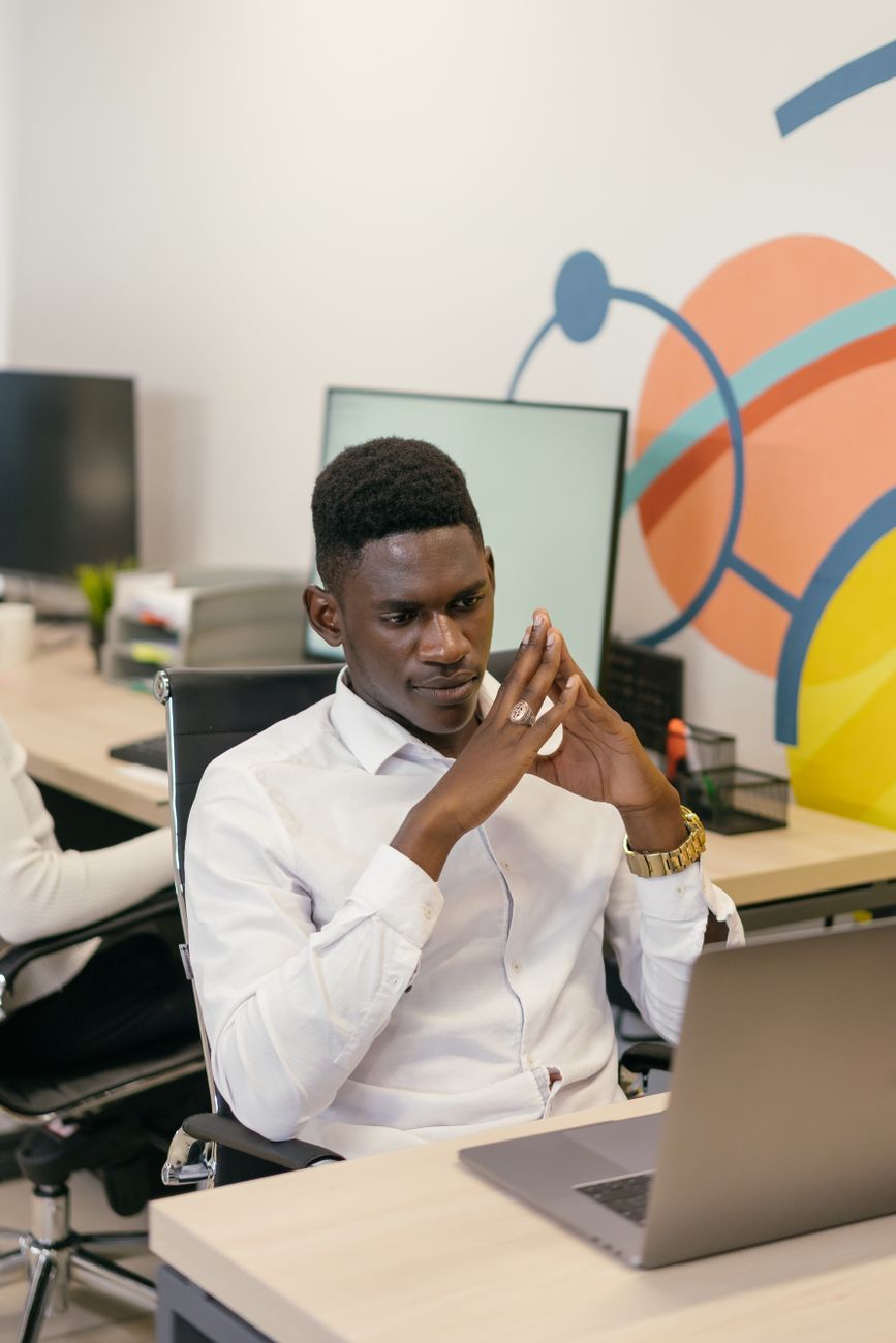 African entrepreneur creator working on a laptop building a business