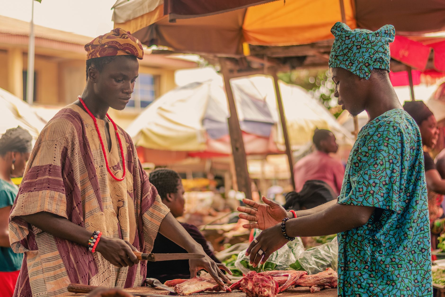 Colorful traditional African clothing displayed at a cultural market