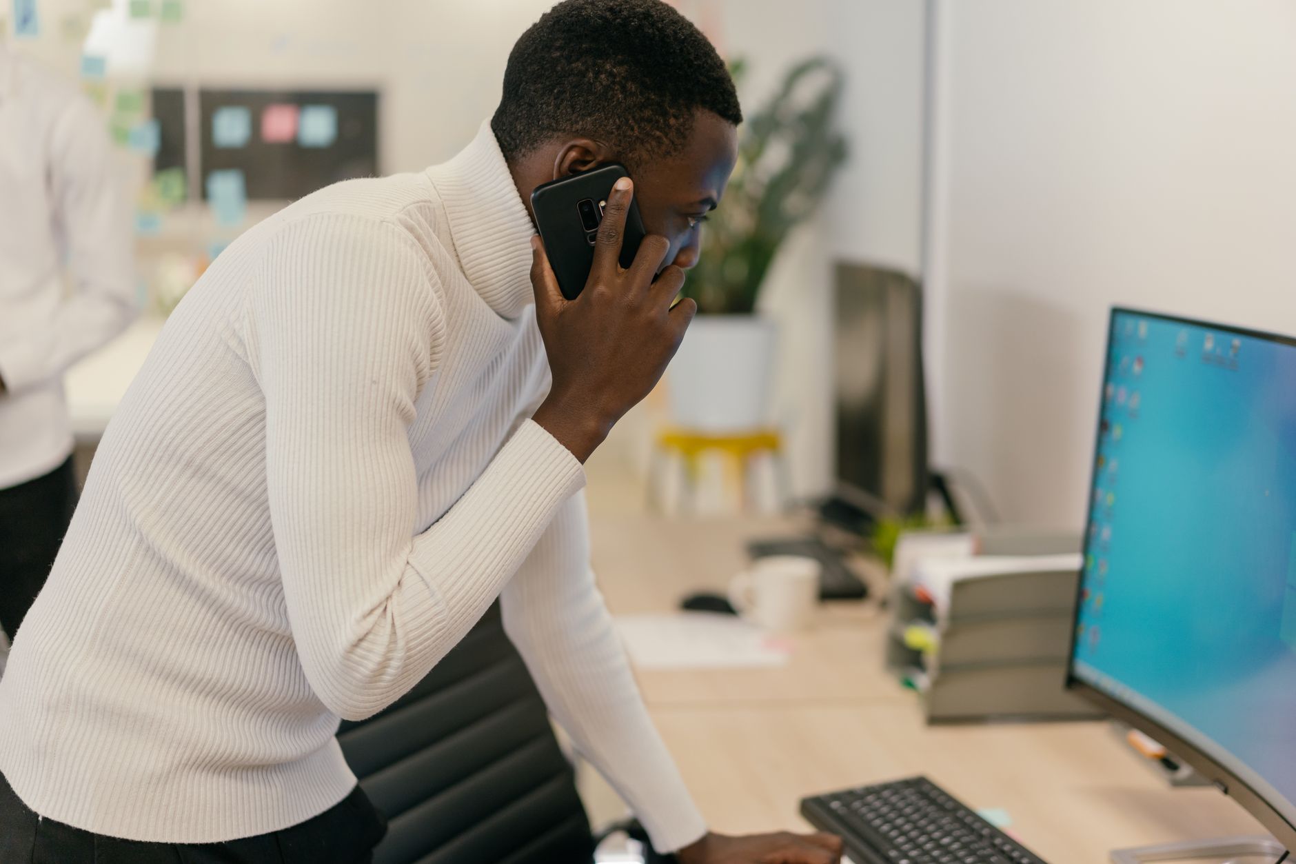 African entrepreneurs and digital creators collaborating in a modern workspace