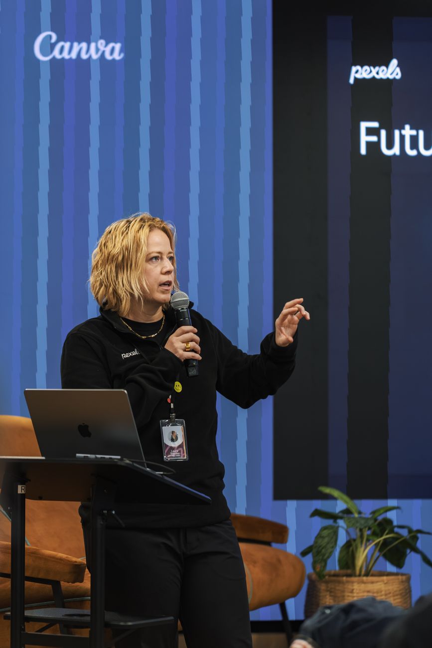 Speaker presenting on stage at an African tech and innovation summit