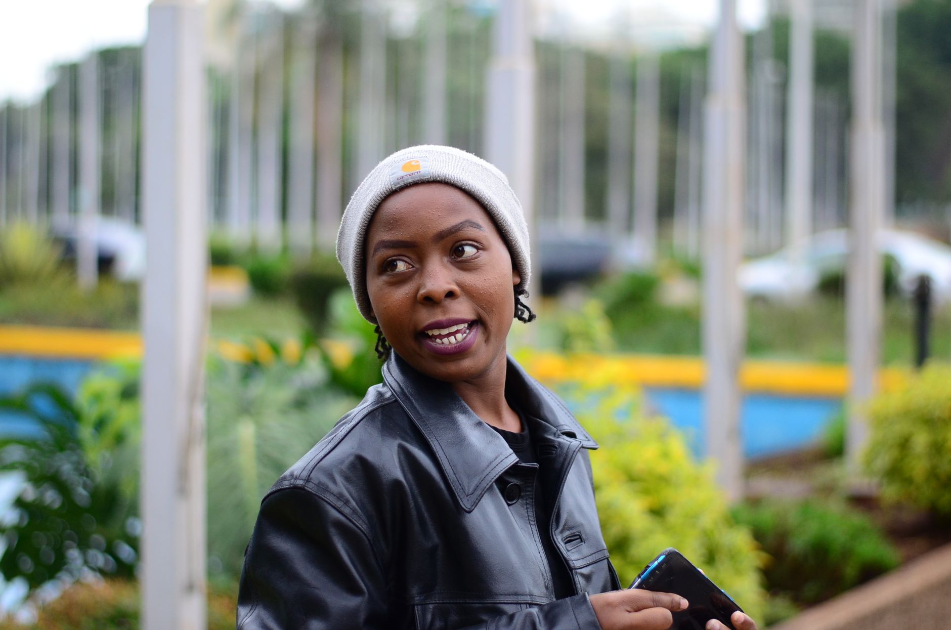 Kenyan female content creator laughing on camera
