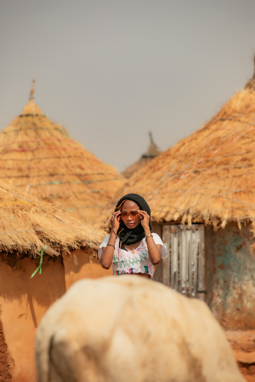 Travel storytelling creator filming in African village