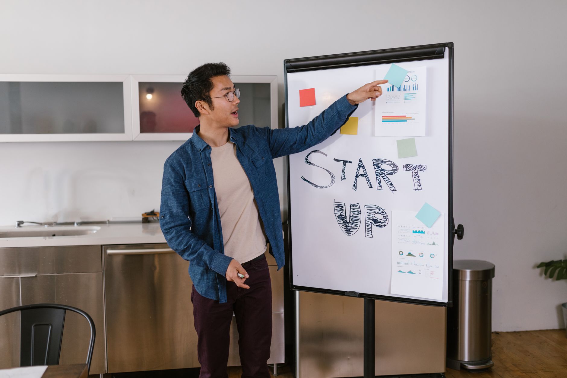 African startup founder presenting business plan to investors