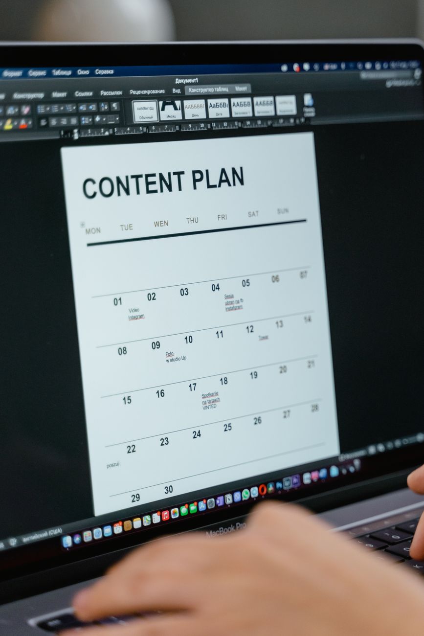 African creator using AI tools on tablet for content planning