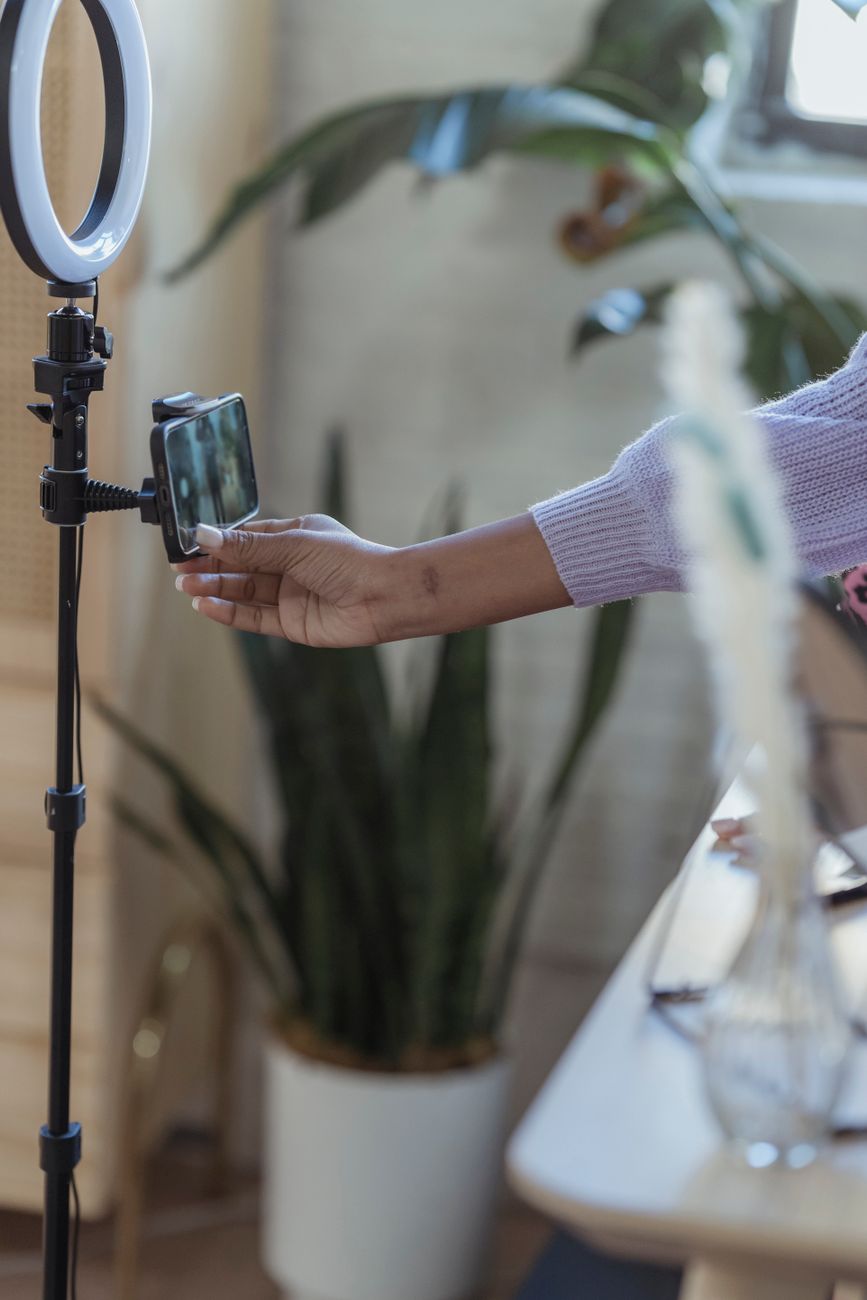 African content creator recording video for Facebook audience growth