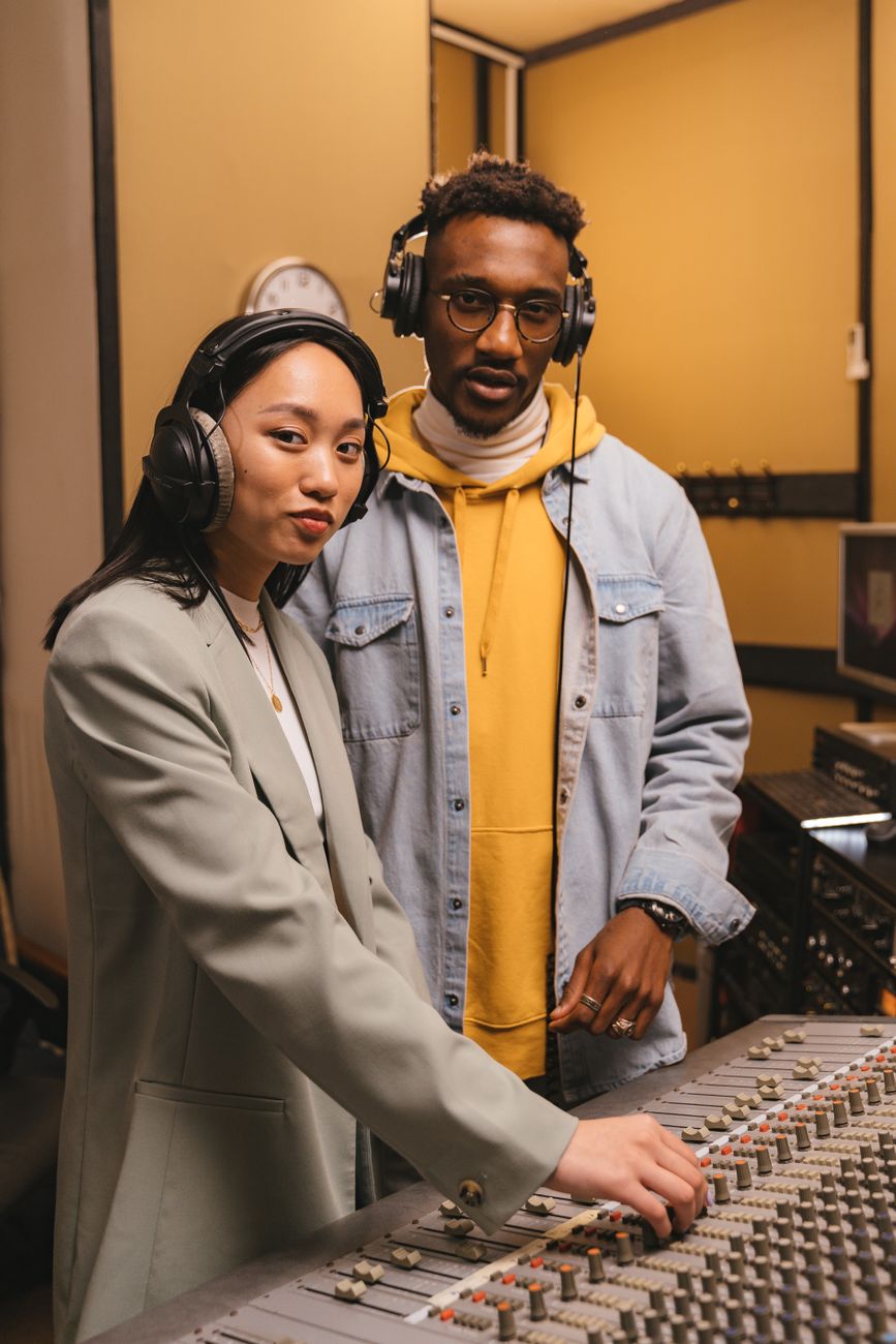 African creator recording music content in a modern studio