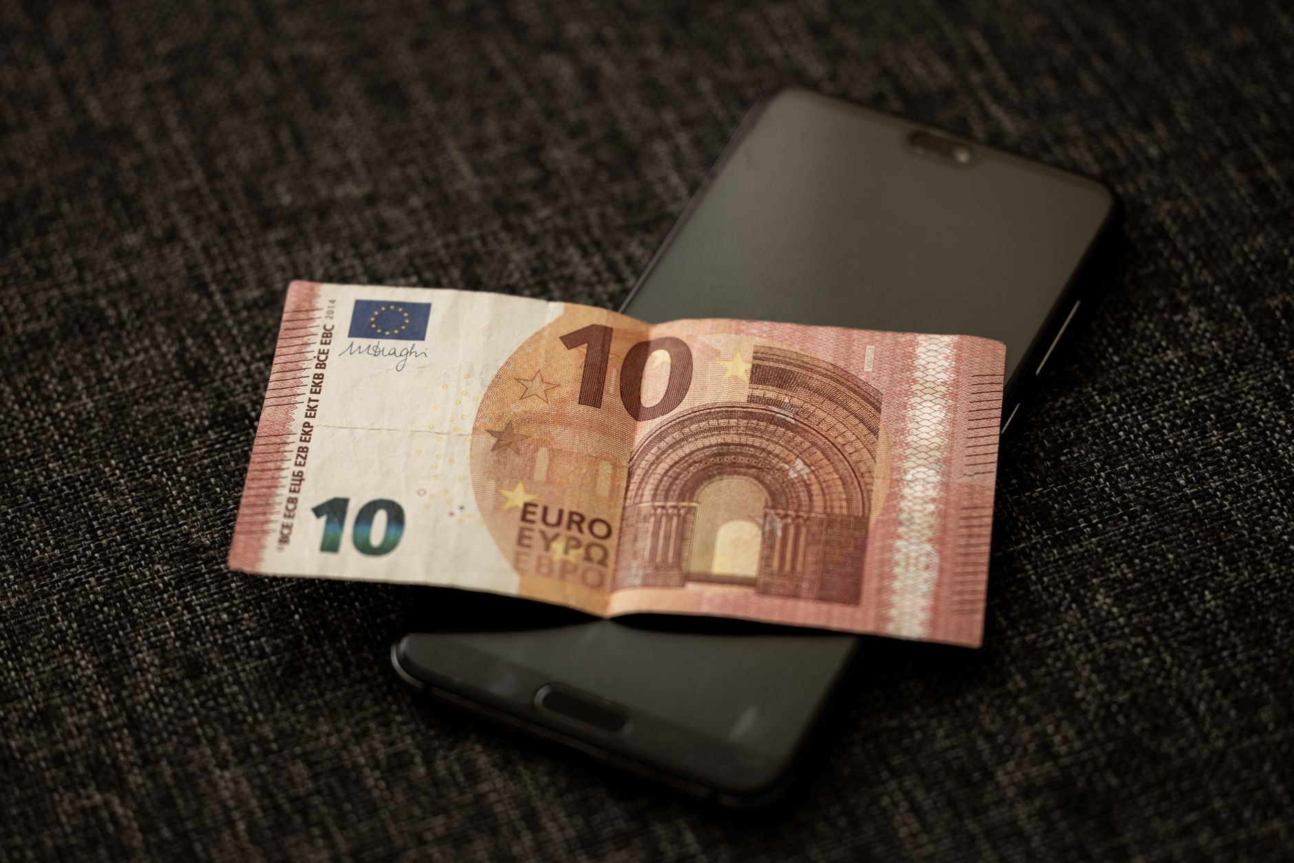 Mobile phone showing fintech payment app in Africa