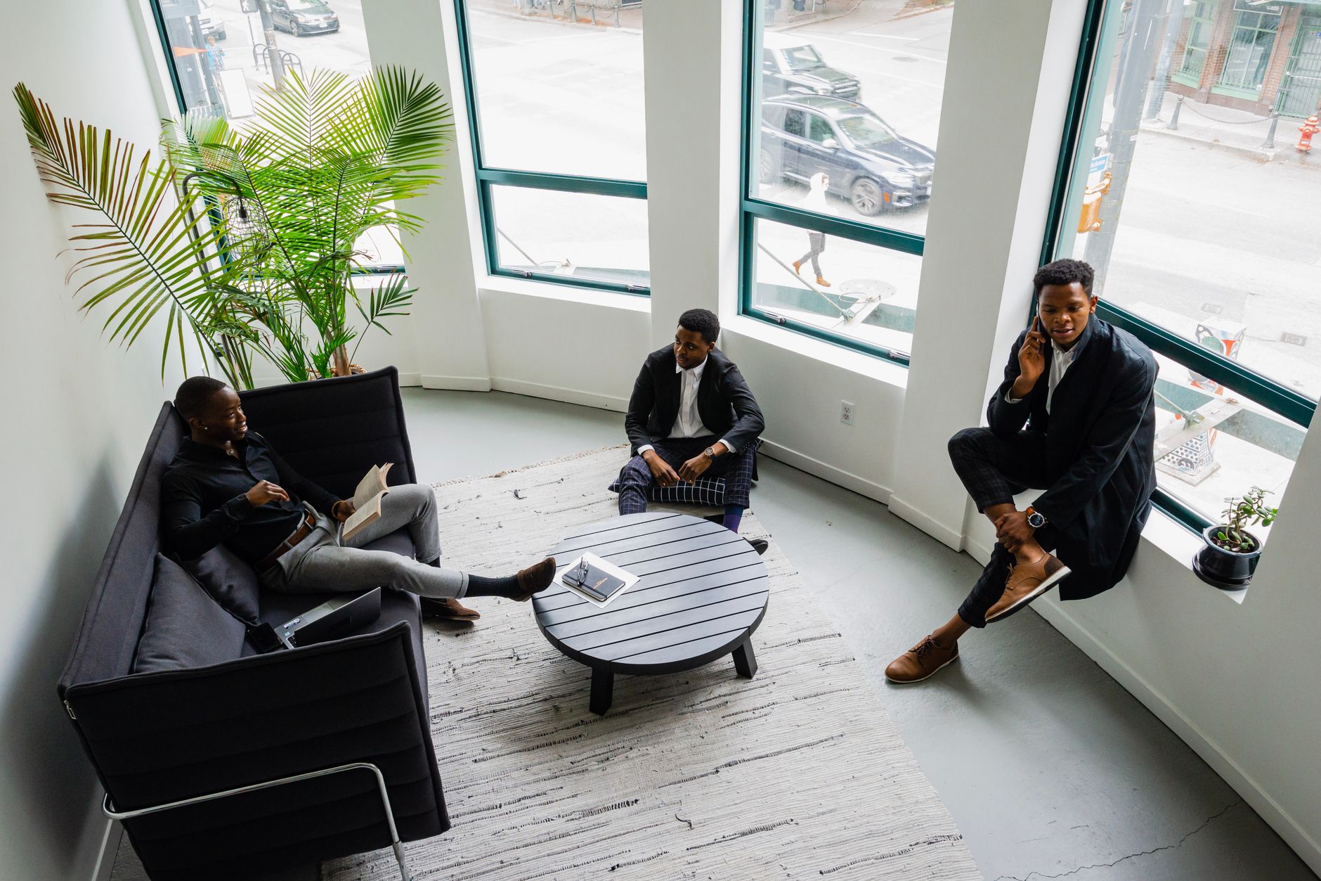 African startup founders collaborating in a modern co-working space